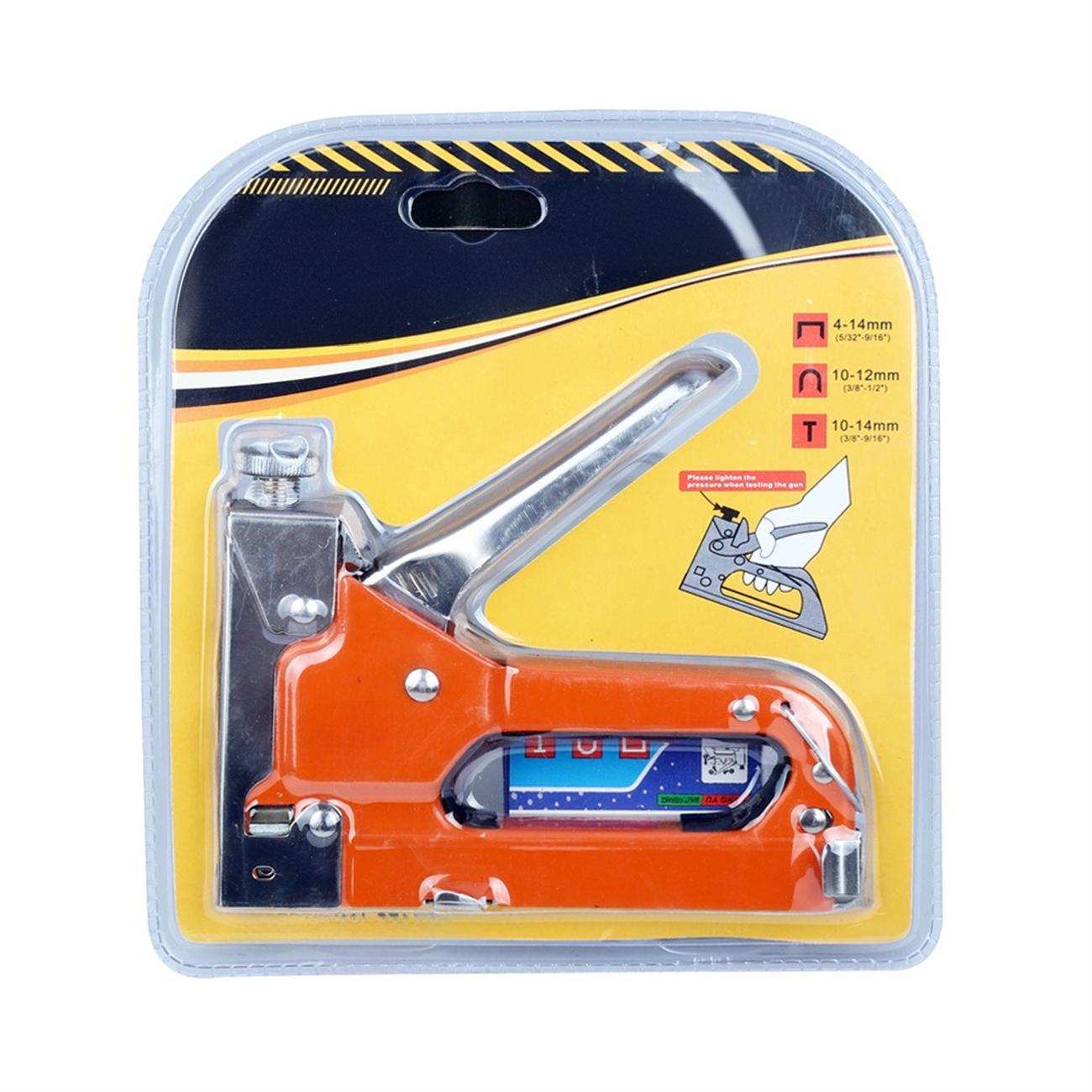 Eine orangefarbene Tackerpistole in einer transparenten Kunststoffverpackung mit Diagrammen und Anweisungen.