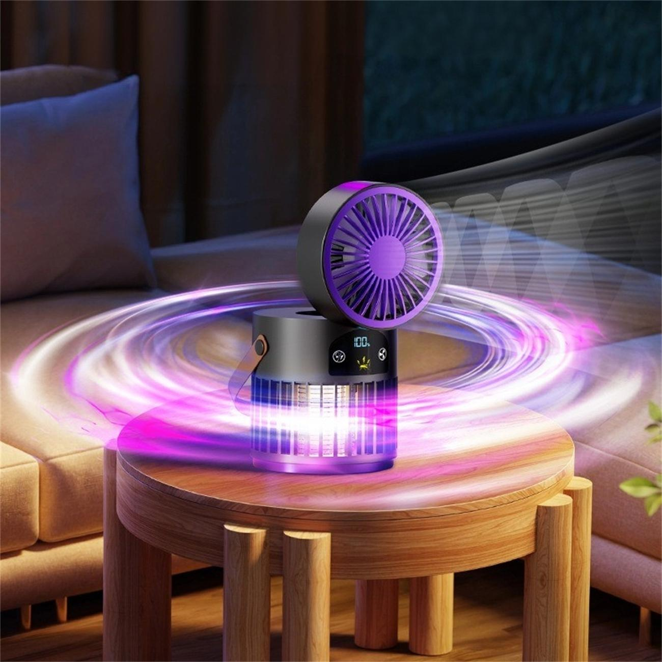 Ein kleines, fächerförmiges Gerät auf einem Holztisch. Es strahlt ein violettes Licht aus.