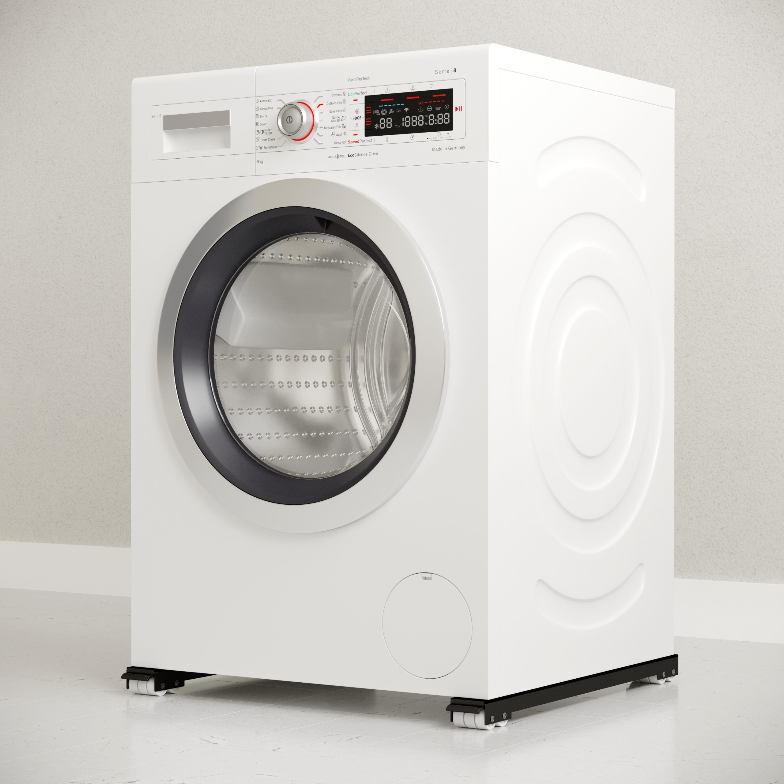 A white washing machine on a white background. The washing machine is in a studio setting.