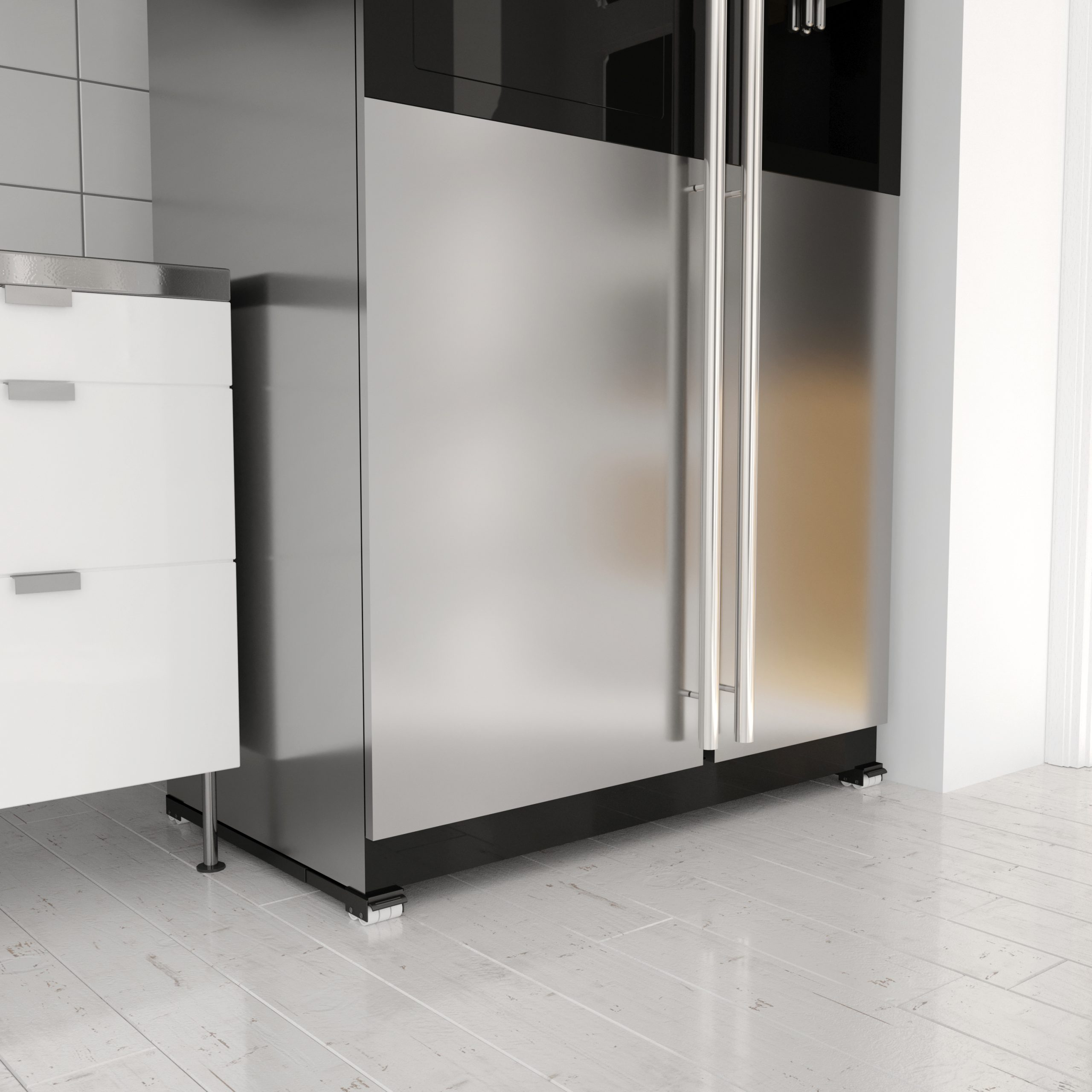 A stainless steel refrigerator with handles, white cabinets and a white floor.