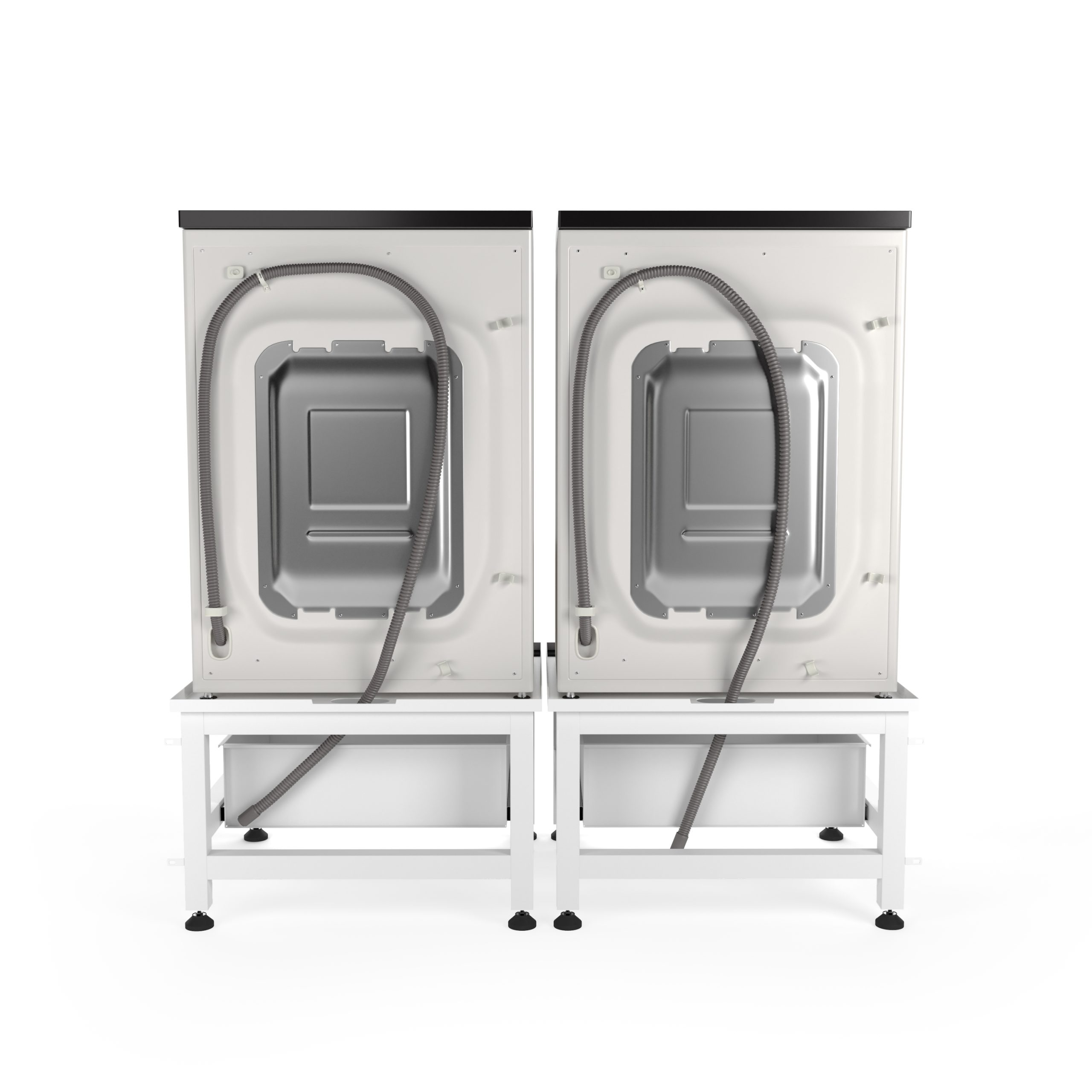 Two white washing machines on white stands, viewed from behind. Grey hoses extend to the floor. White background.