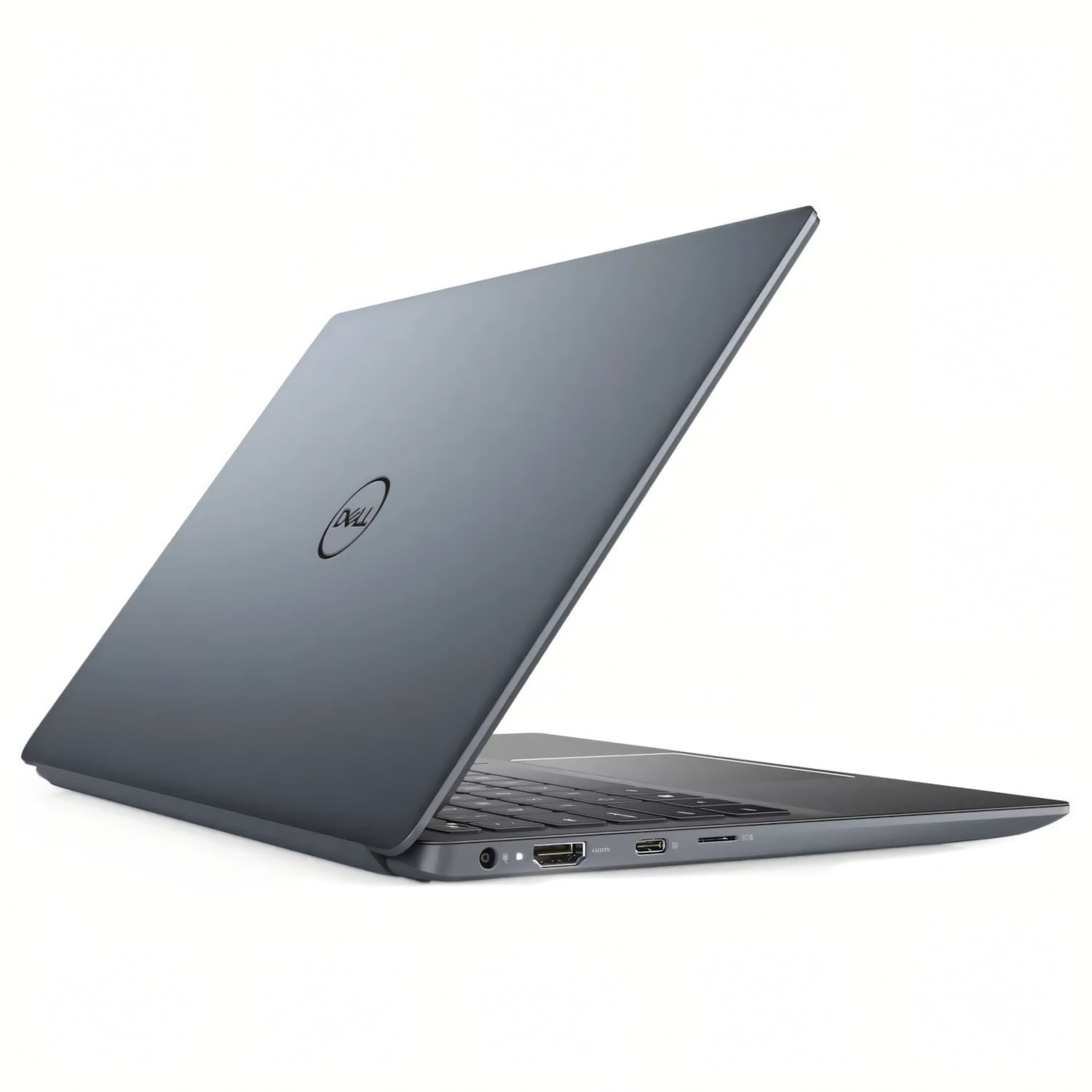 Una laptop Dell gris está abierta, mostrando el teclado y los puertos. La tapa está abierta.