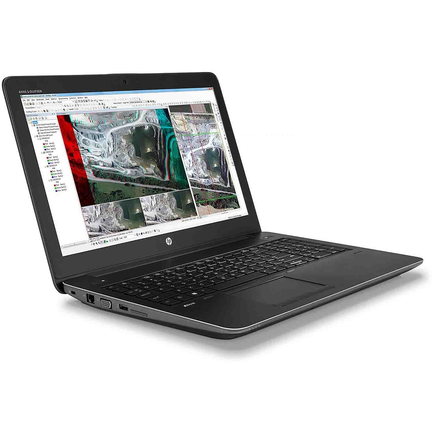 Portátil negro abierto, mostrando una pantalla con datos complejos; teclado y panel táctil visibles.