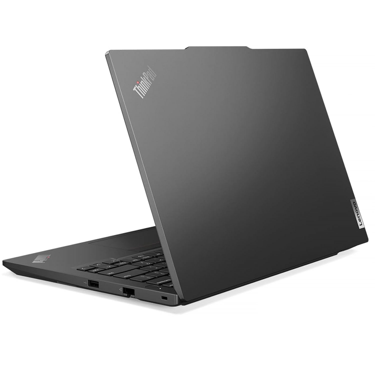 Portátil negro, vista trasera, logo ThinkPad visible, superficie gris.
