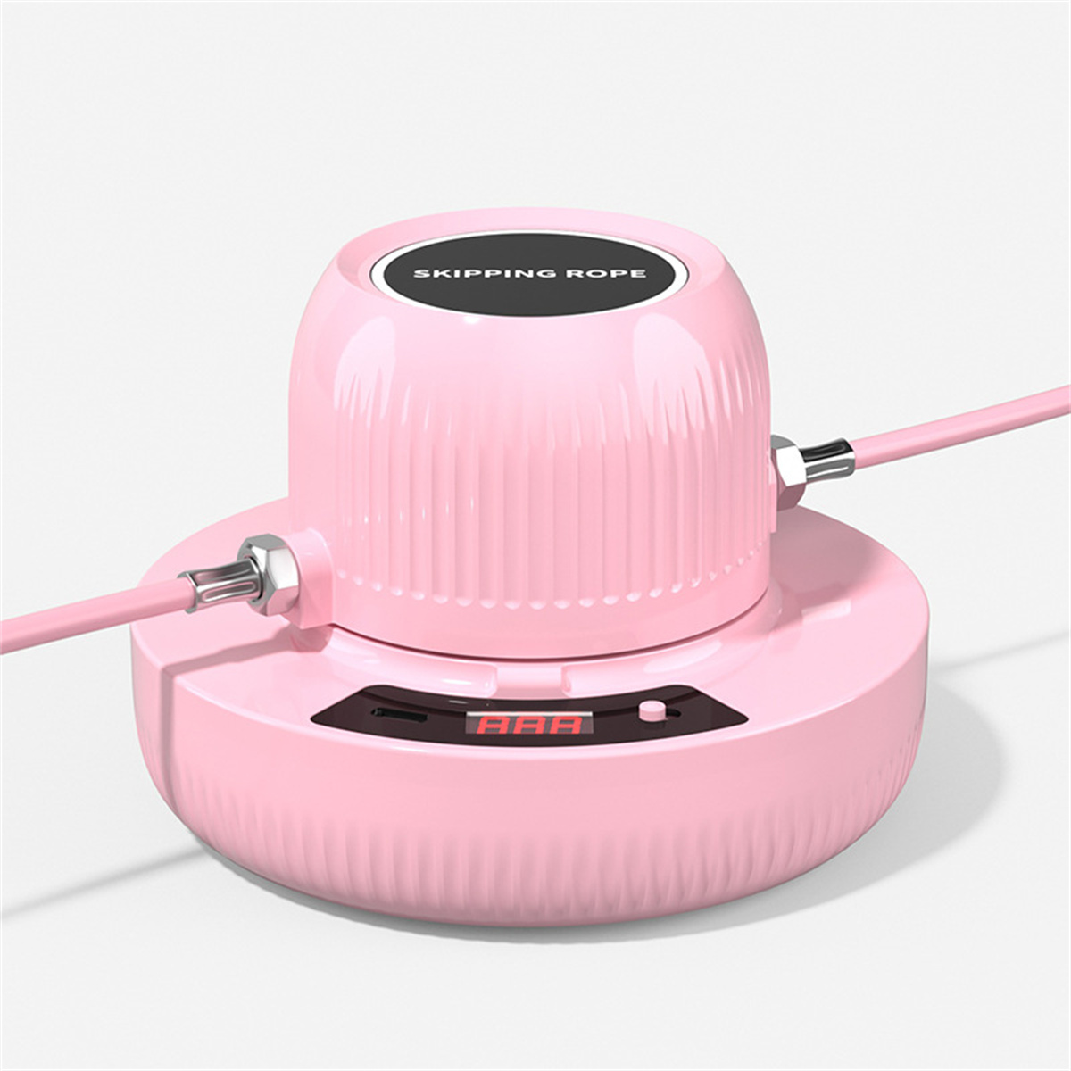 Ein pinkfarbenes Springseil mit digitalem Zähler. Das Seil ist pink und hat eine schwarze Anzeige.