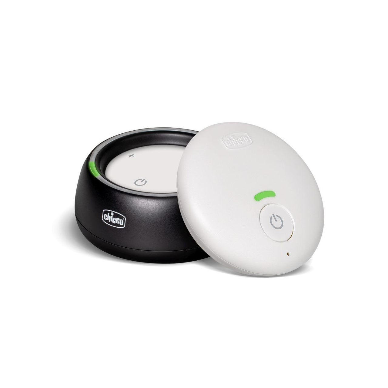 Un baby monitor in bianco e nero. La base nera tiene il monitor, con un coperchio bianco staccato.