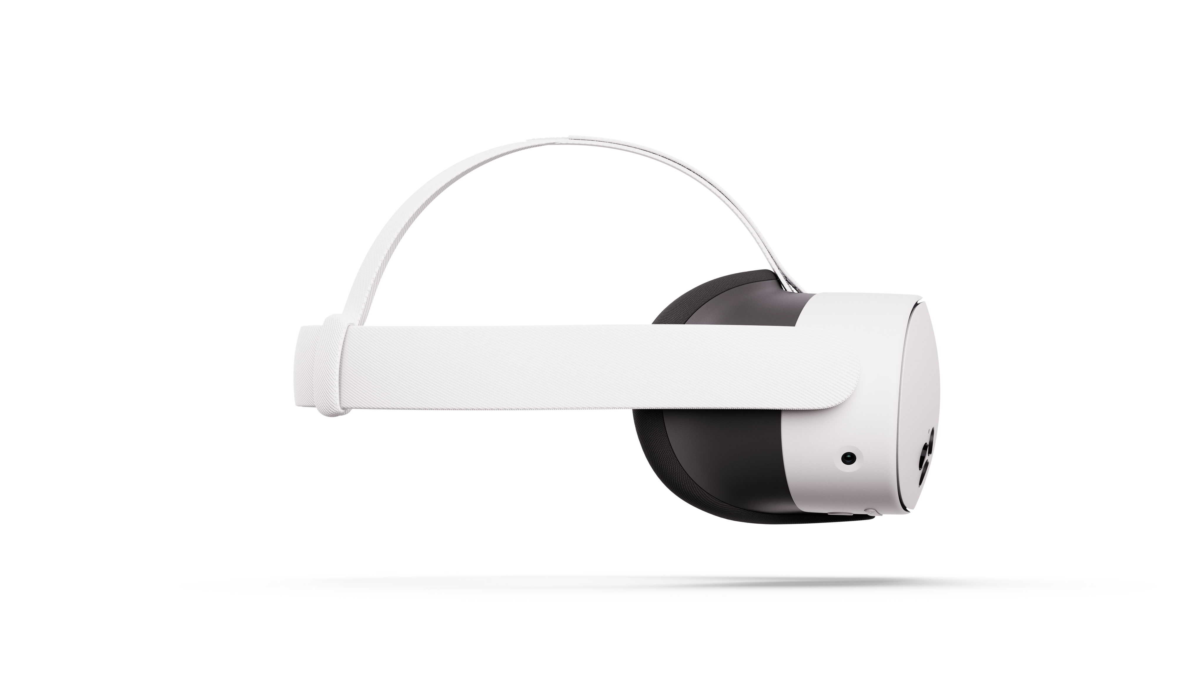 Vista laterale di un visore VR bianco con imbottitura nera, su uno sfondo bianco.