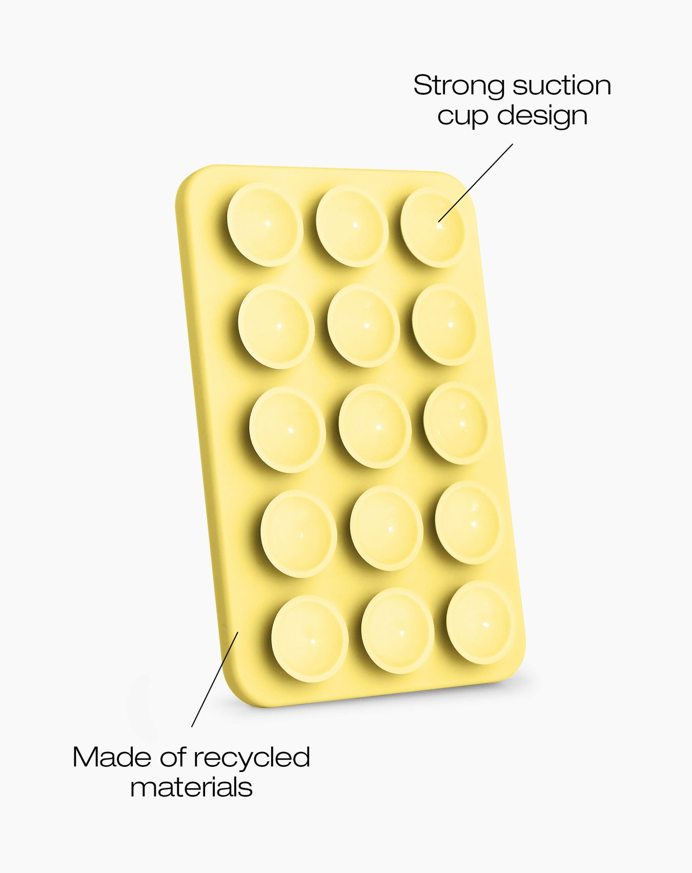 Ein gelber Telefonhalter mit Saugnäpfen. Er ist rechteckig und aus recycelten Materialien hergestellt. Weißer Hintergrund.