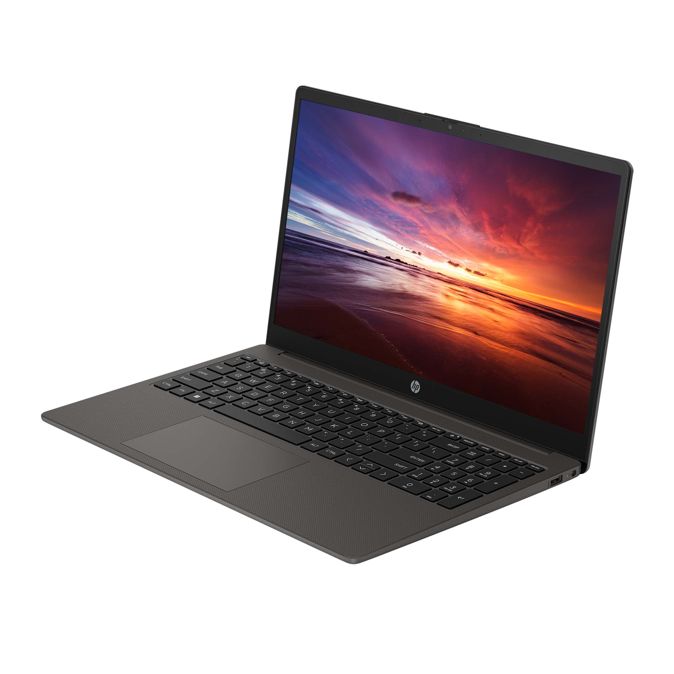 Laptop auf Weiß. Bildschirm zeigt Sonnenuntergang am Strand. Schwarze Tastatur, dunkelgraues Gehäuse, weißer Hintergrund.