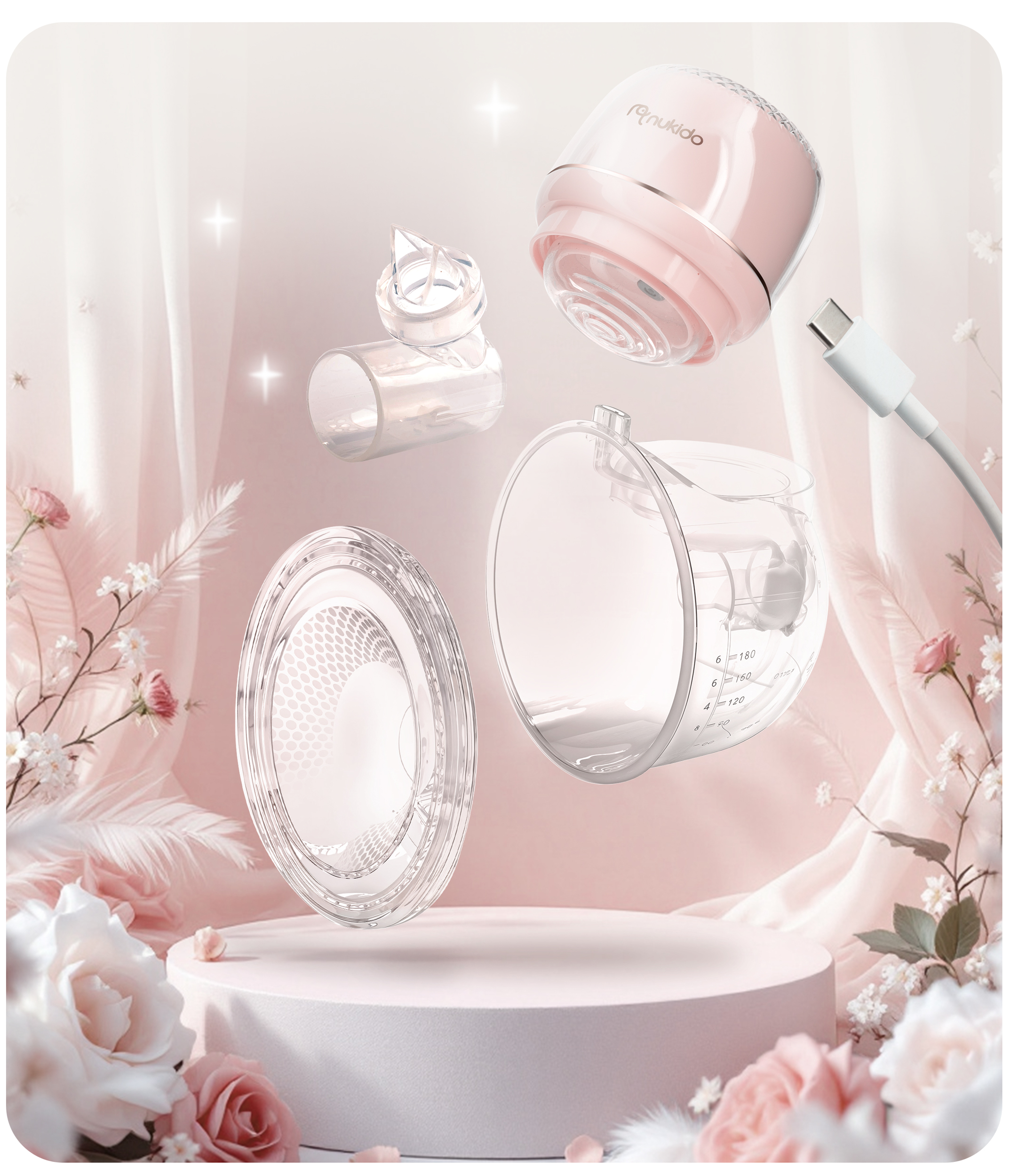 Różowe elementy laktatora na platformie. Zawiera pompkę, złącze i butelkę z kablem USB.