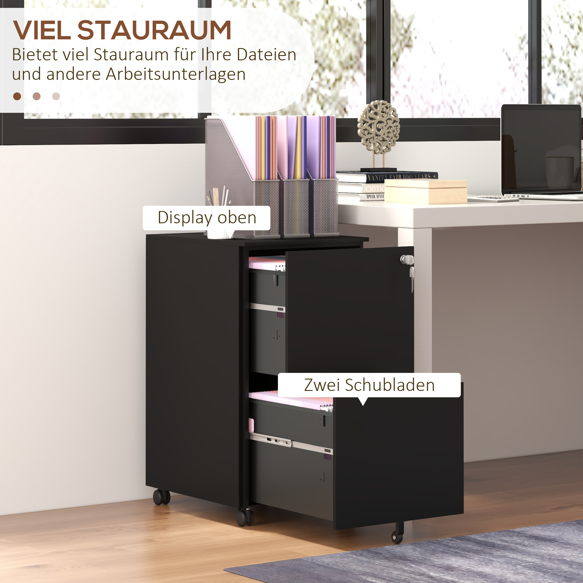 Ein schwarzer Aktenschrank mit zwei geöffneten Schubladen und einem Datei-Organizer oben.