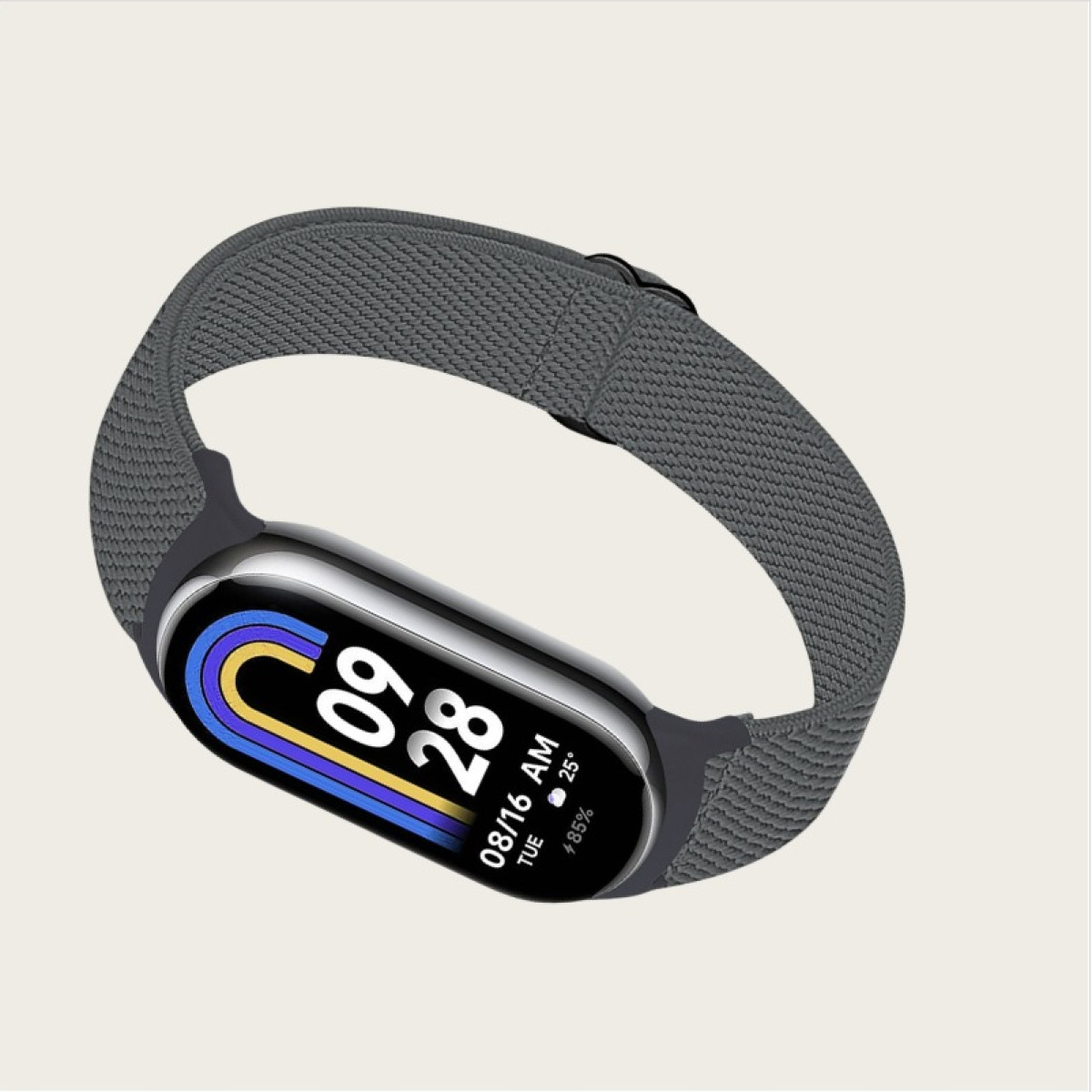 Eine graue Smartwatch mit grauem Armband zeigt Datum und Uhrzeit an, mit 85 % Akku.