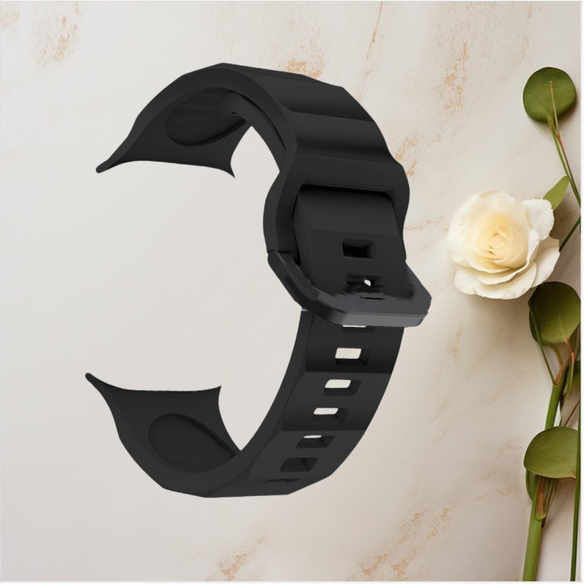 Schwarzes Uhrenarmband mit Schnalle, in der Nähe einer Blume.