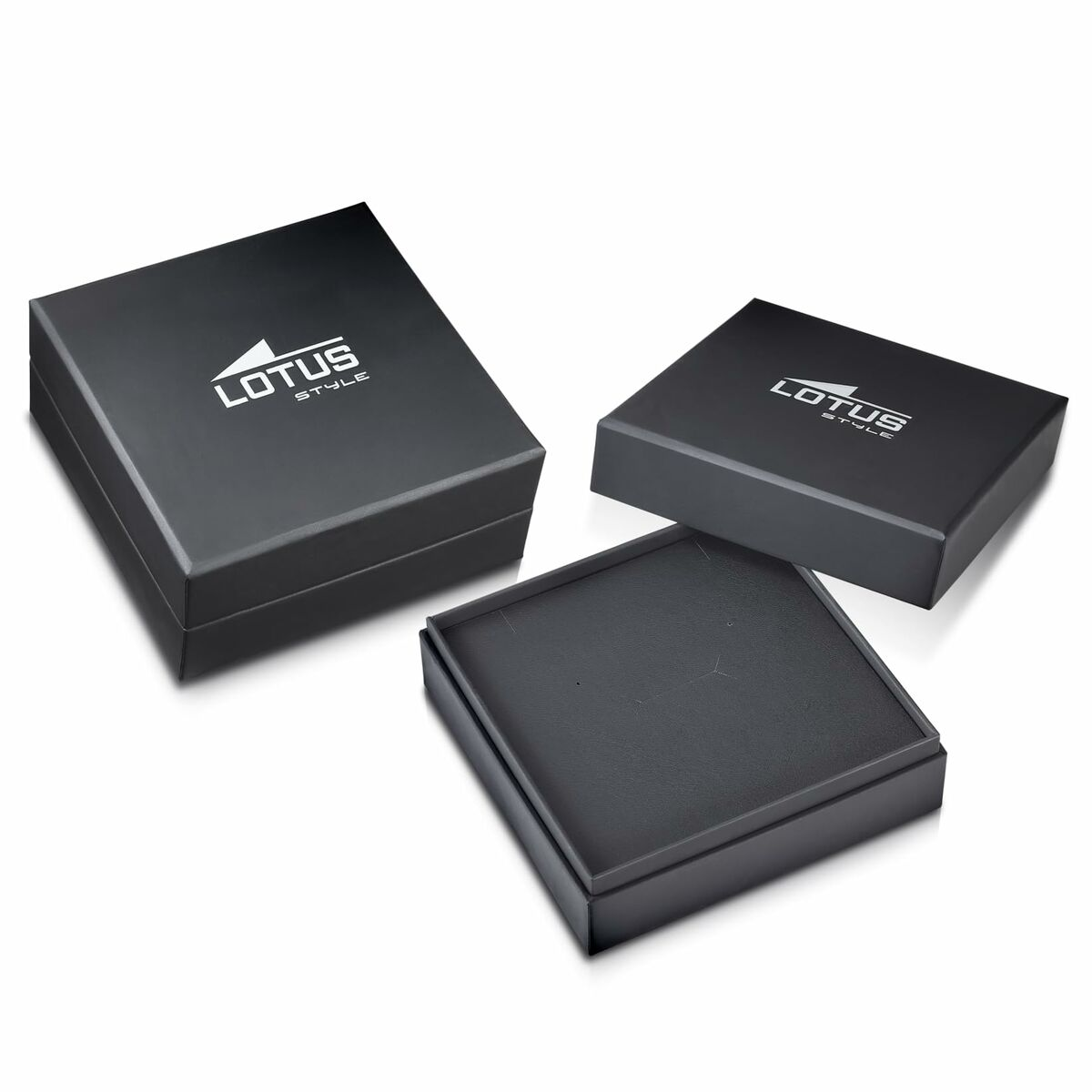 Drei schwarze Geschenkboxen mit dem Logo 'Lotus Style' auf weißer Oberfläche.