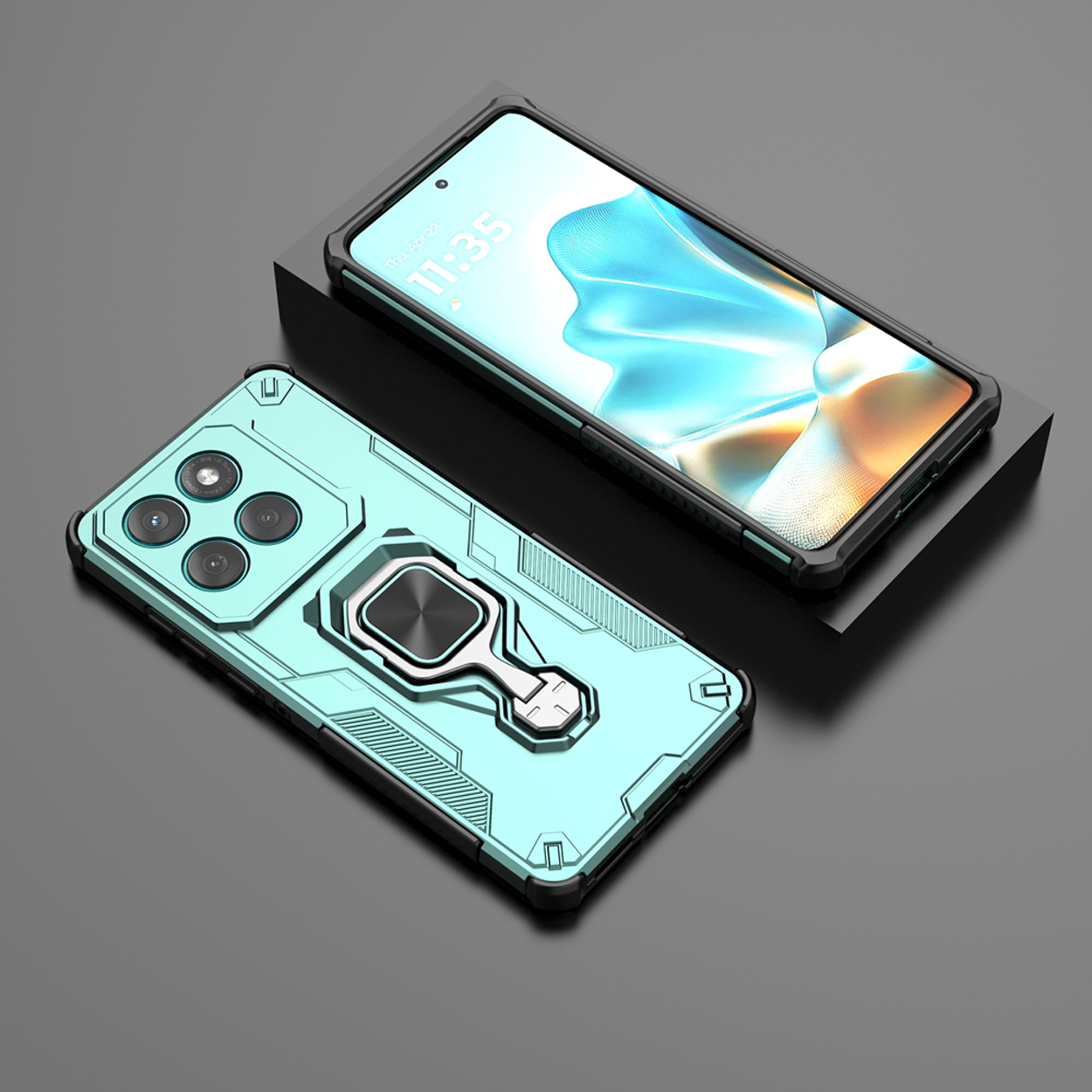 Een turquoise telefoonhoesje met een ringhouder ligt op een zwart oppervlak en toont een telefoonscherm.