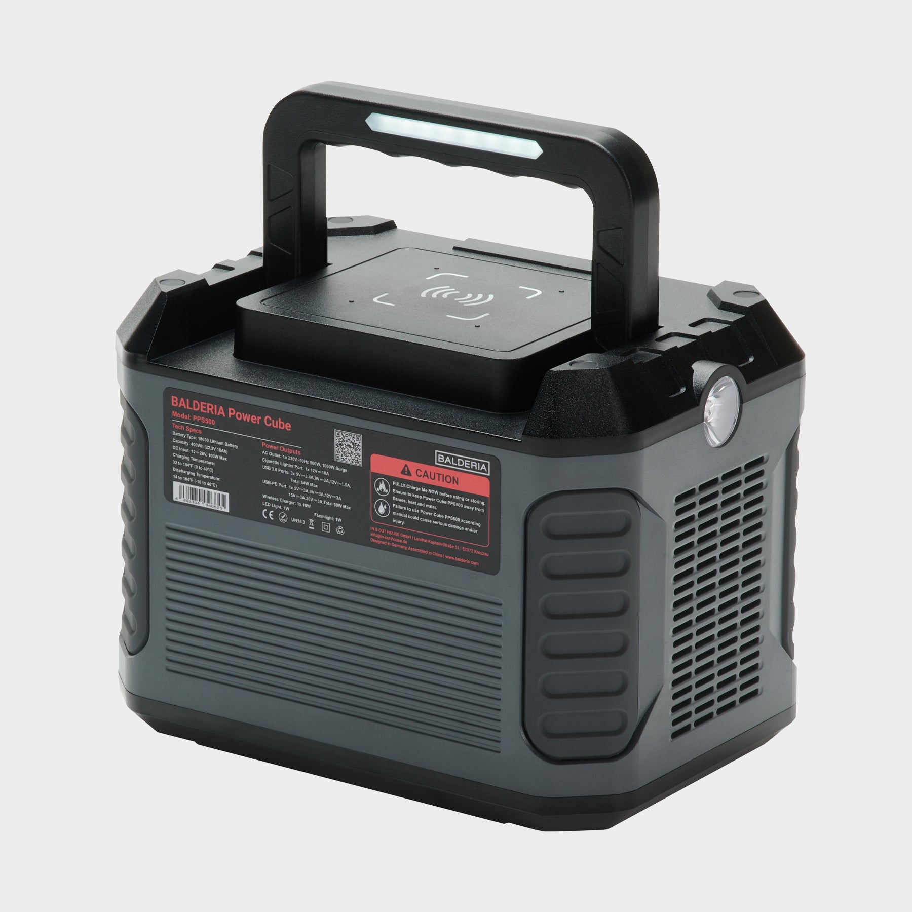Tragbare Powerstation mit Display und Warnhinweisen. Sie hat einen Griff und ist dunkelgrau und schwarz.