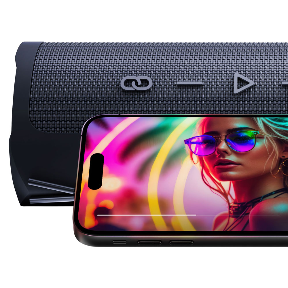 Telefon pokazujący obraz. Głośnik znajduje się za telefonem. Obraz na ekranie przedstawia kobietę.