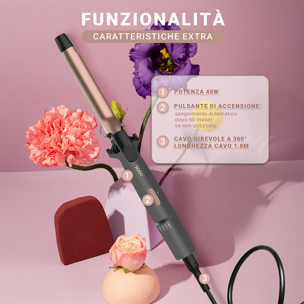 Arricciacapelli con design oro rosa e nero, accanto a fiori e un piccolo oggetto rosso. Lo sfondo è bianco.