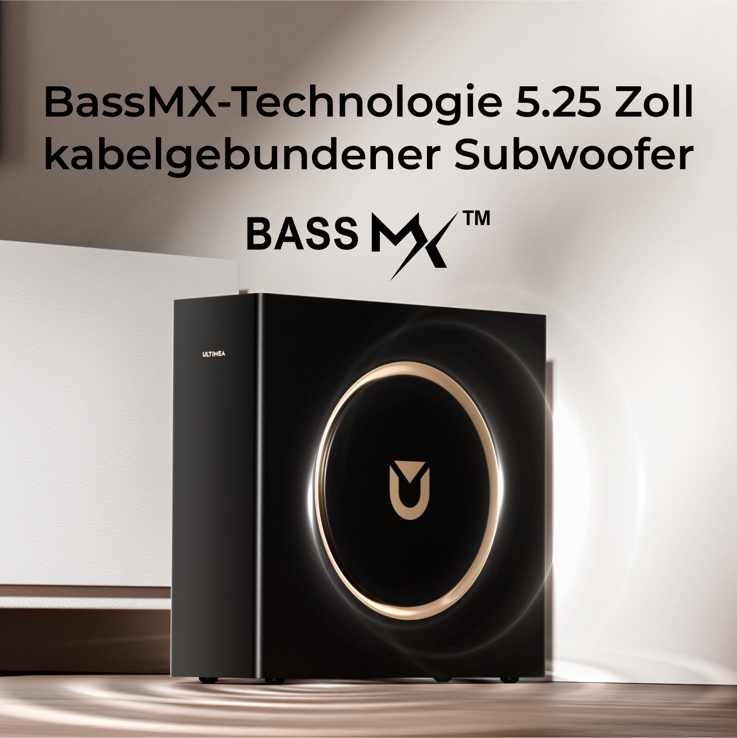 Czarny subwoofer ze złotymi akcentami i logo BassMX. Powyższy tekst brzmi 'BassMX-Technologie 5.25 Zoll kabelgebundener Subwoofer'.