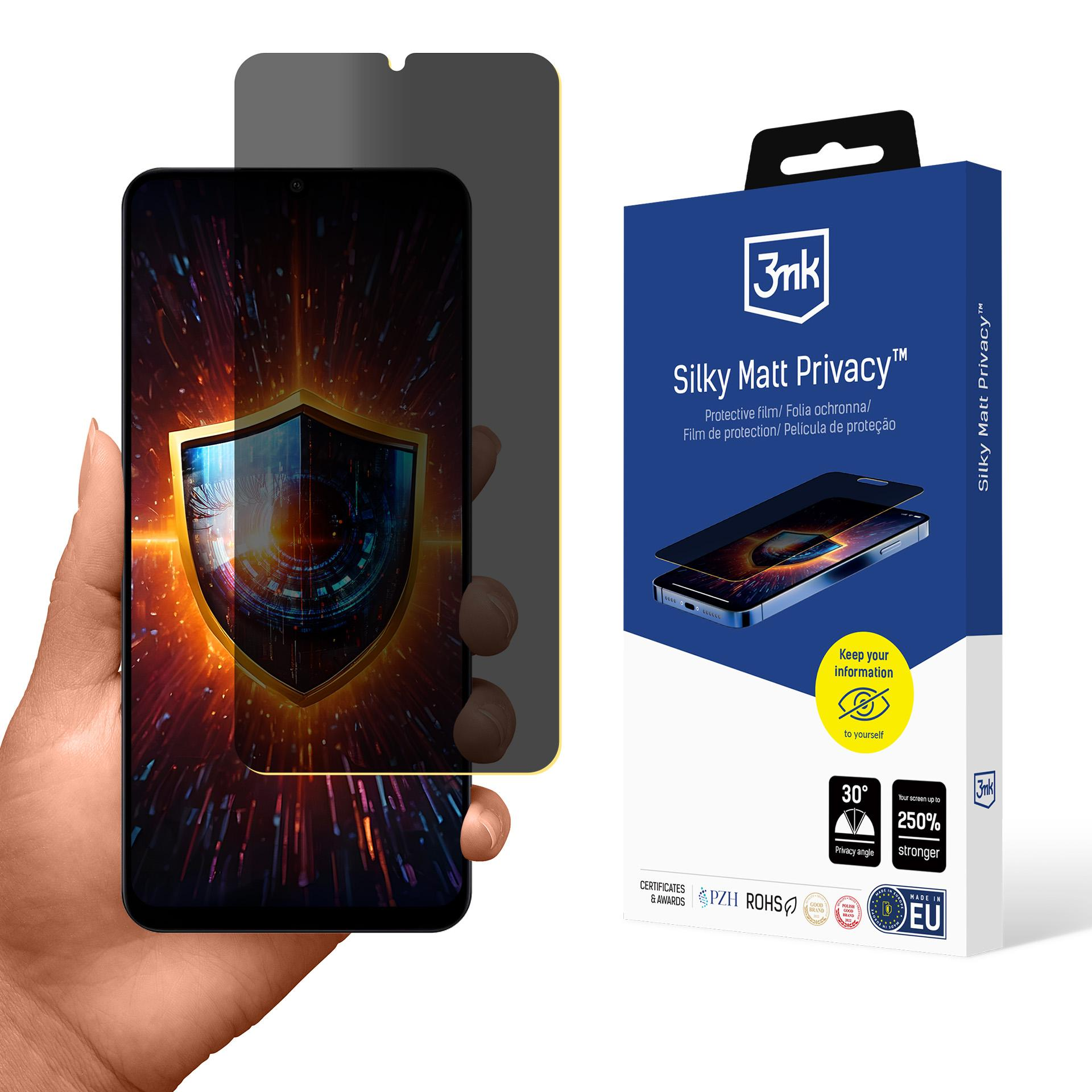 Una mano tiene un telefono con una protezione per la privacy e una scatola con informazioni sul prodotto sulla destra.