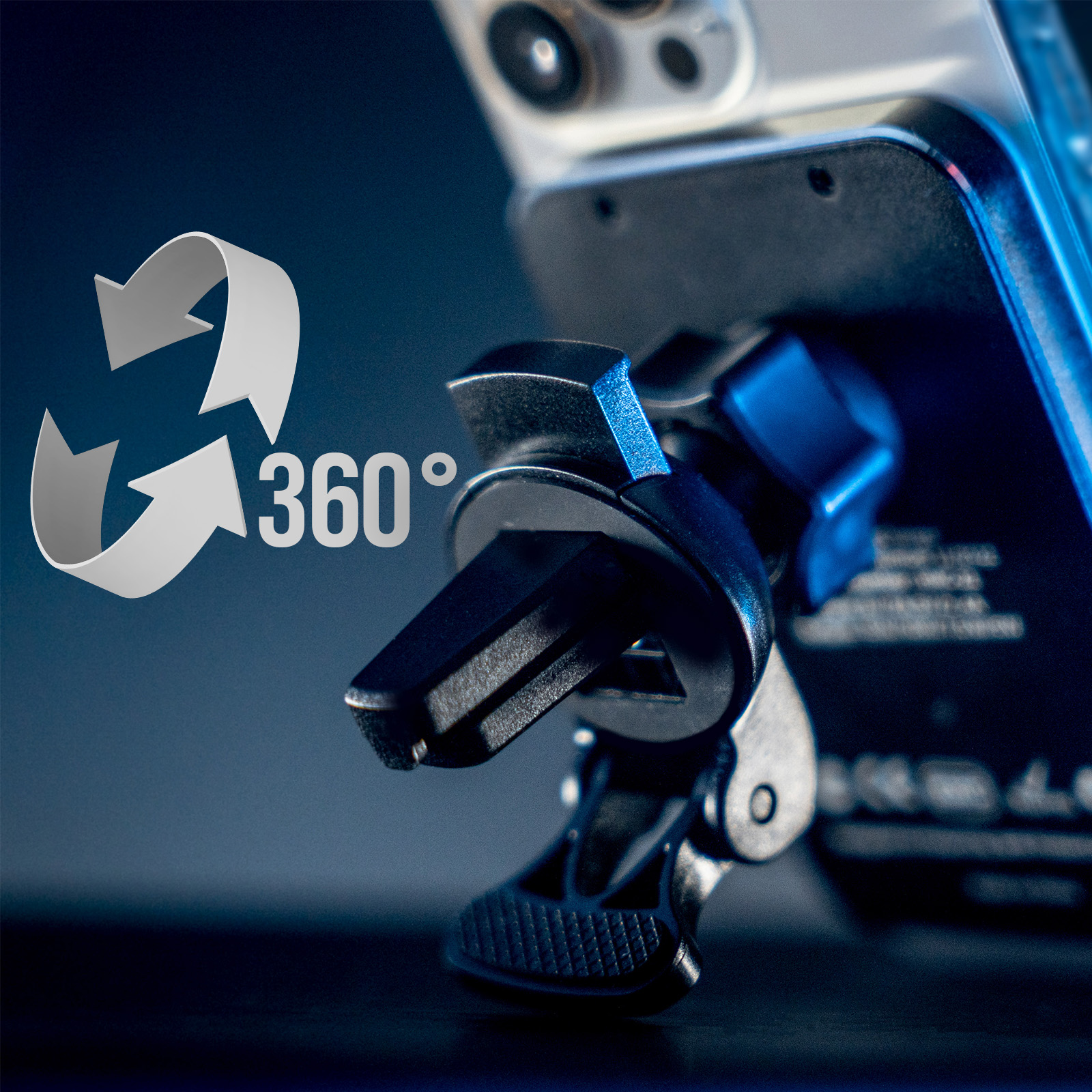 Uchwyt samochodowy do telefonu z dołączonym smartfonem. Uchwyt jest czarny, a telefon biały.