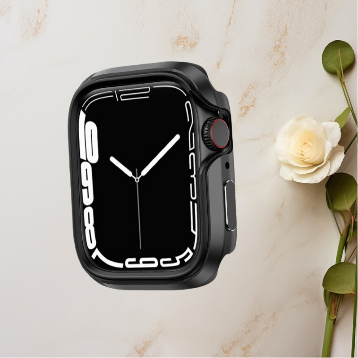 Smartwatch nero con schermo nero e rosa bianca su marmo.