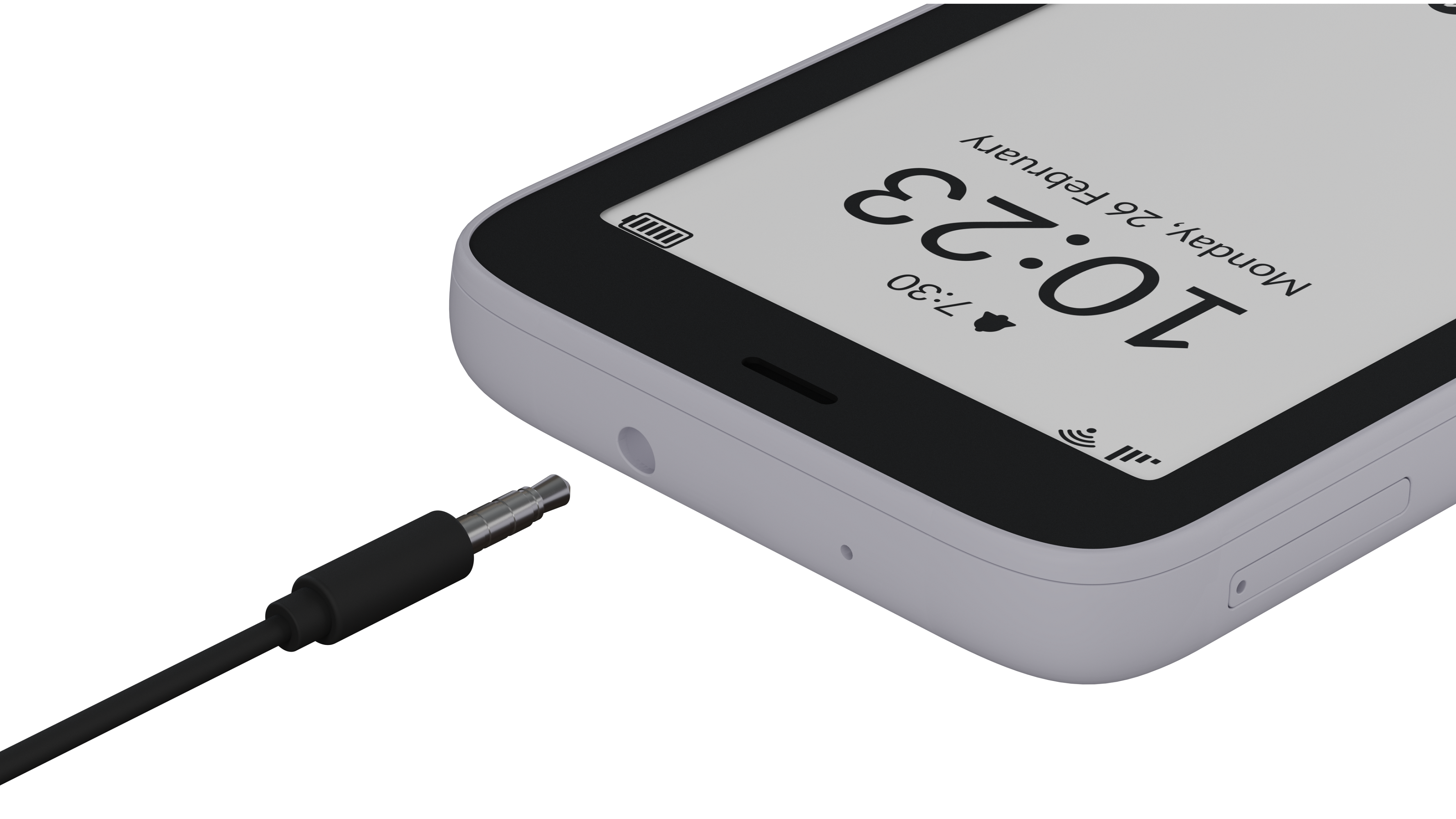 Nahaufnahme eines Smartphones mit einem schwarzen Kabel, das in die Audiobuchse gesteckt ist.