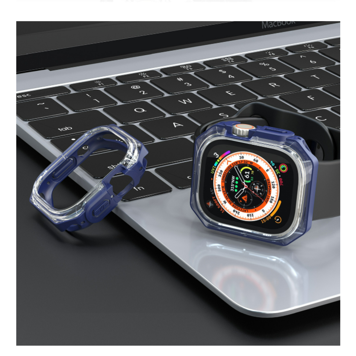 Una cassa blu per orologio e l'orologio sono sulla tastiera di un laptop. Il quadrante mostra i dati.