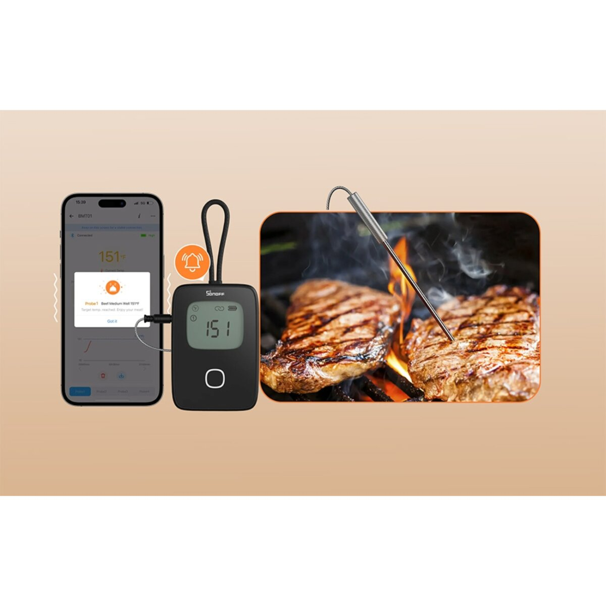 Telefon i termometr pokazujące temperaturę, obok grillowanych steków.