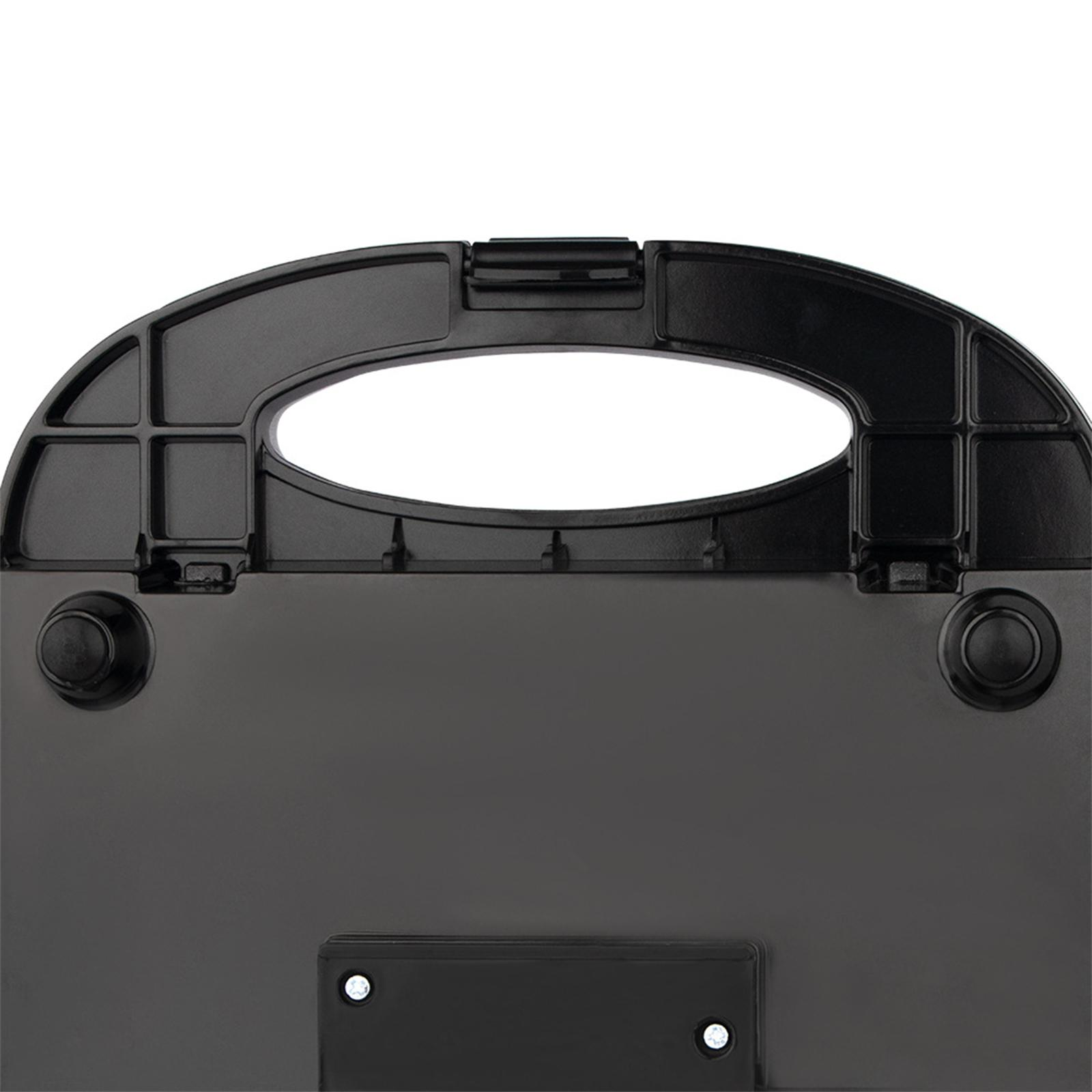 Der Boden eines schwarzen Sandwichmakers mit zwei runden Füßen und Befestigungsschrauben. Das Design ist einfach und funktionell.