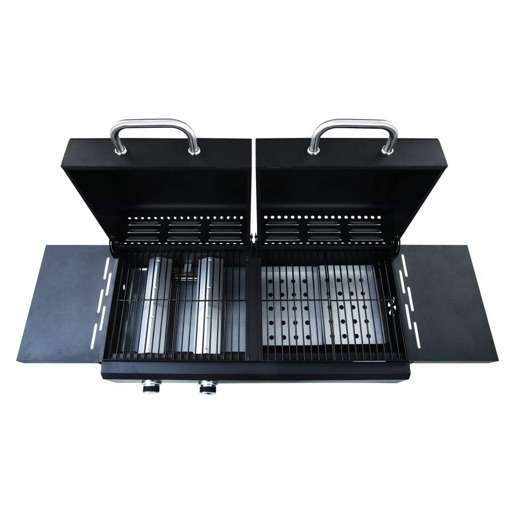 Un barbecue nero con due coperchi aperti rivela griglie metalliche.