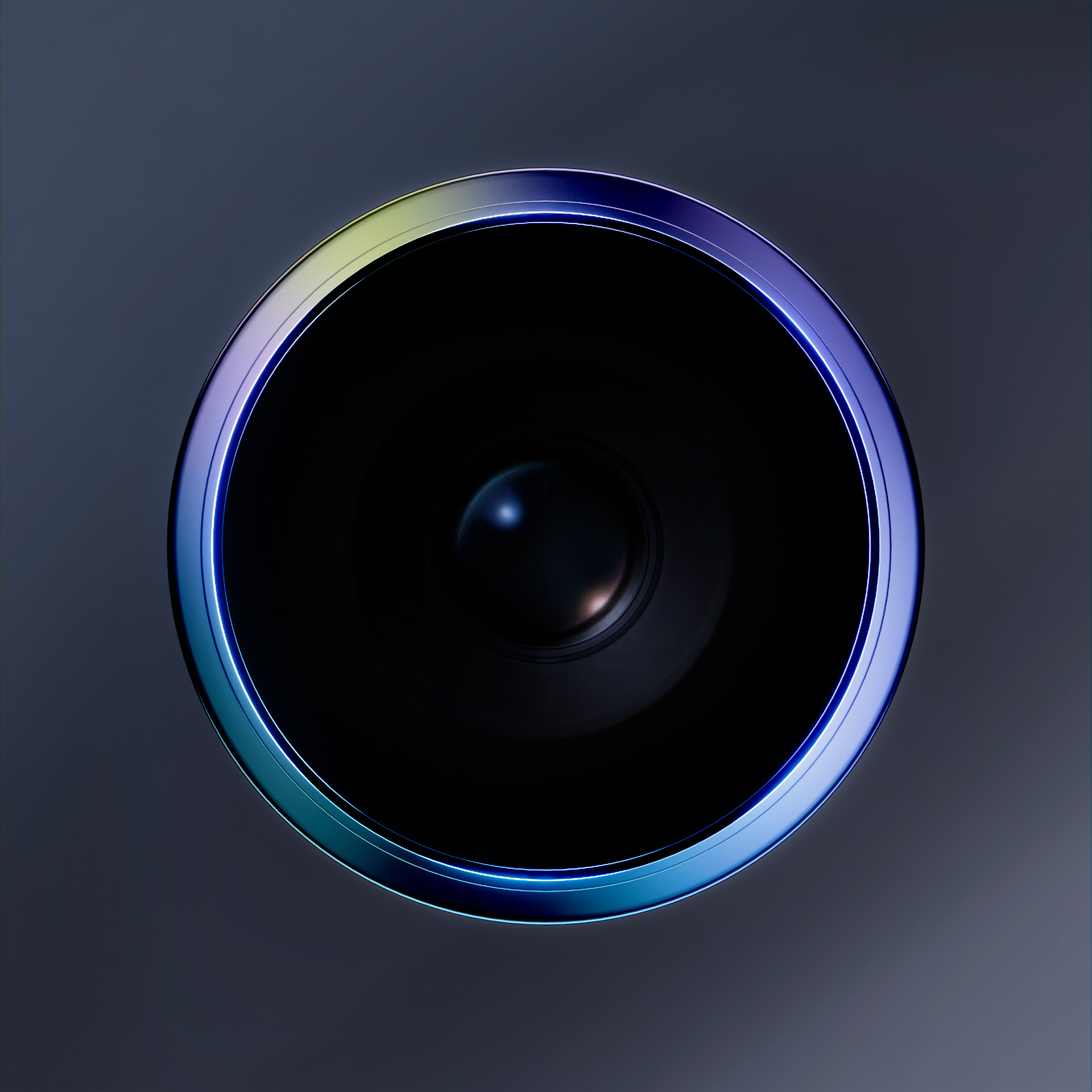 Zbliżenie obiektywu aparatu telefonicznego z niebiesko-zielonym pierścieniem wokół niego.