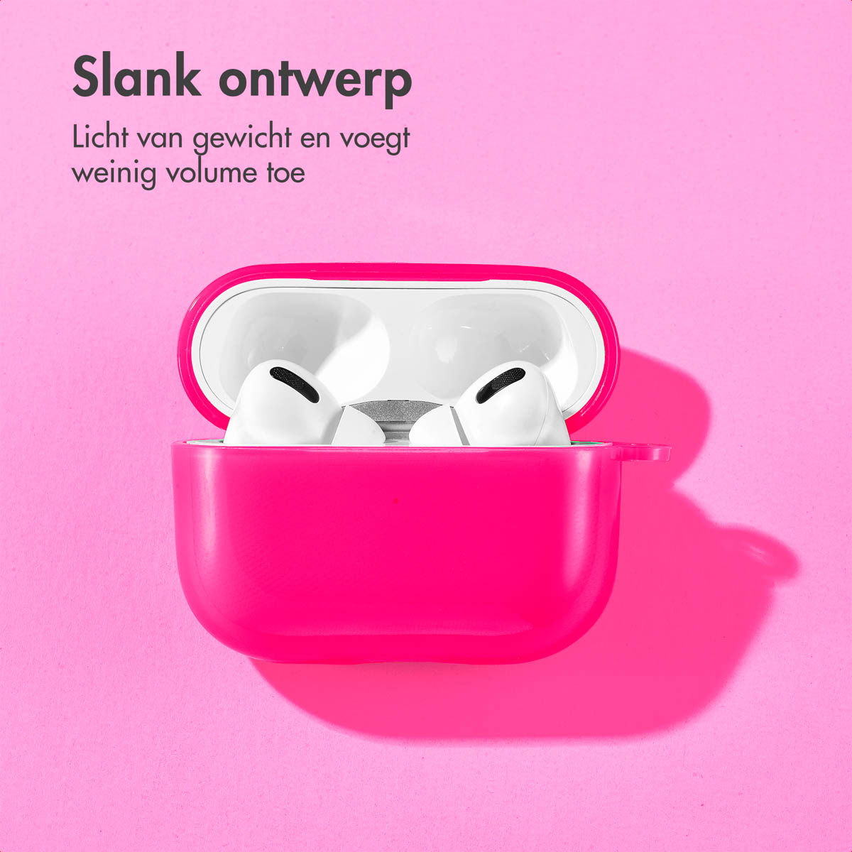 Open pink AirPod case with Airpods inside. The case is on a pink background.