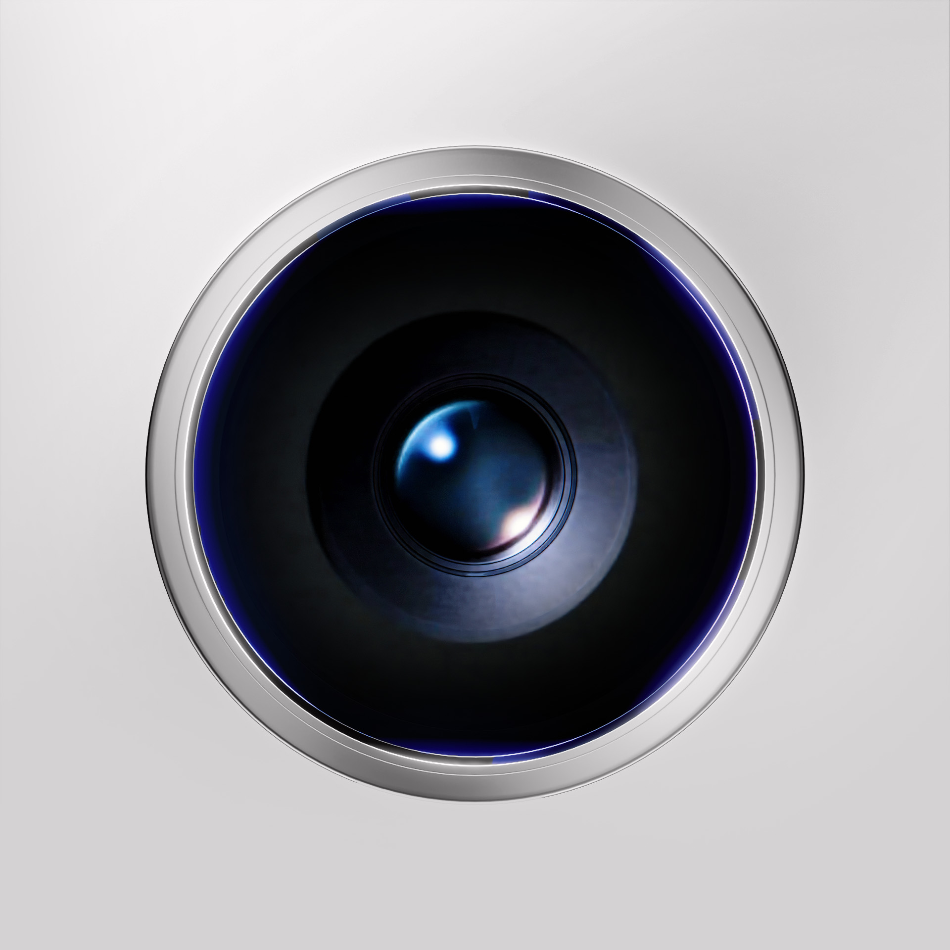 Primo piano dell'obiettivo, lente nera con anello argentato e contorno blu brillante.