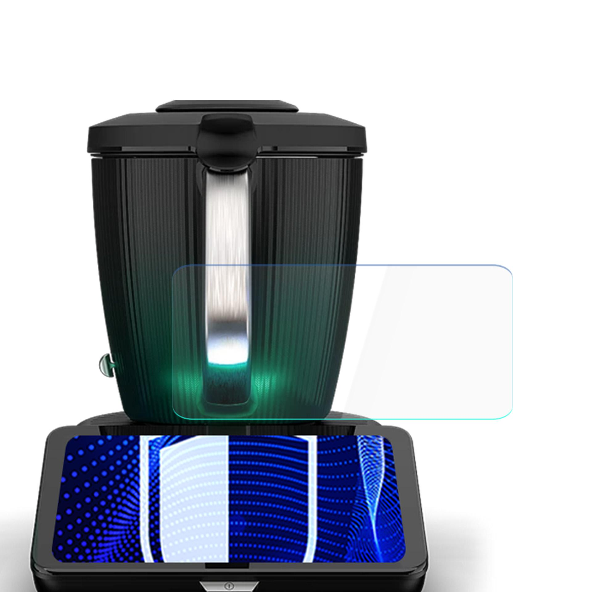 Czarne urządzenie z ekranem i światłem. Ekran pokazuje niebieskie linie. Prostokątna przezroczysta folia jest na ekranie.