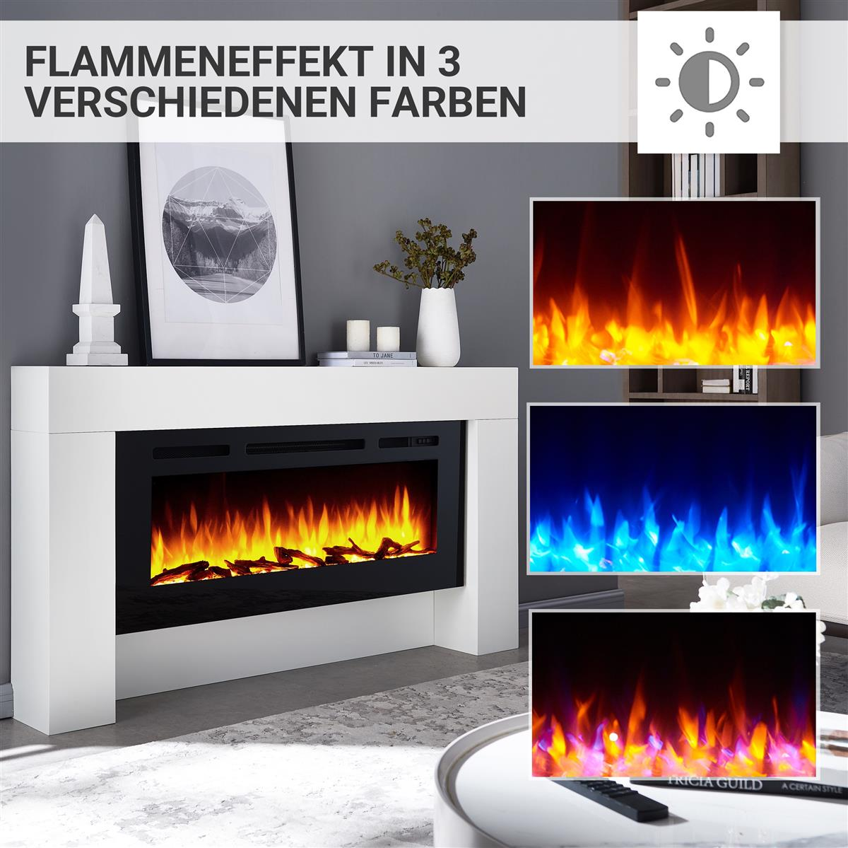 Ein weißer Kamin zeigt Flammen in Orange, Blau und Lila. Daneben ein gerahmtes Bild, eine Vase und eine Fernbedienung auf einem Tisch.