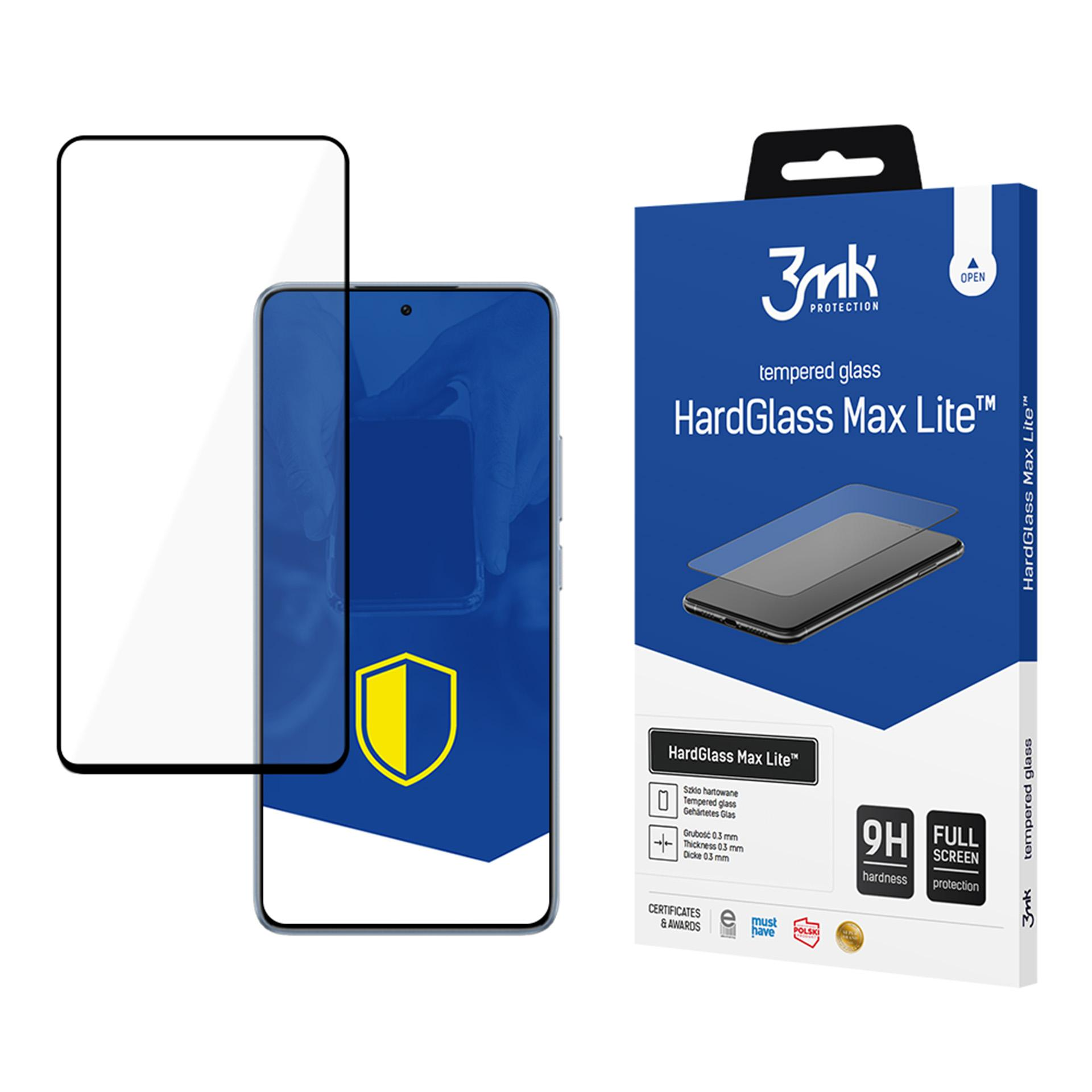 Una scatola di protezione dello schermo del telefono e un telefono. Il protettore è trasparente, la scatola è blu con testo. Prodotto HardGlass Max Lite.
