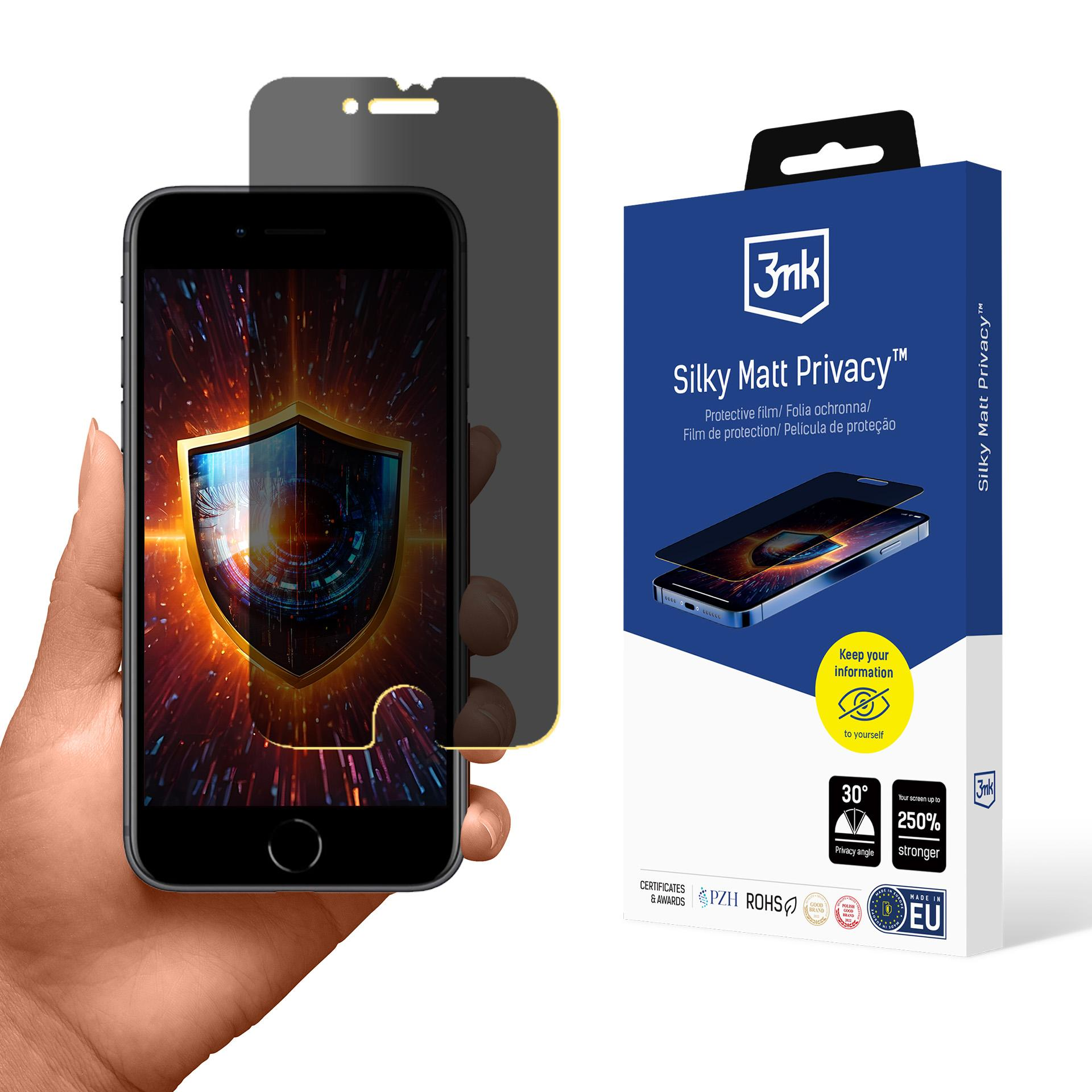 Una mano tiene un telefono con schermo privacy e una scatola. Lo schermo mostra uno scudo, la scatola dice 'Silky Matt Privacy'.
