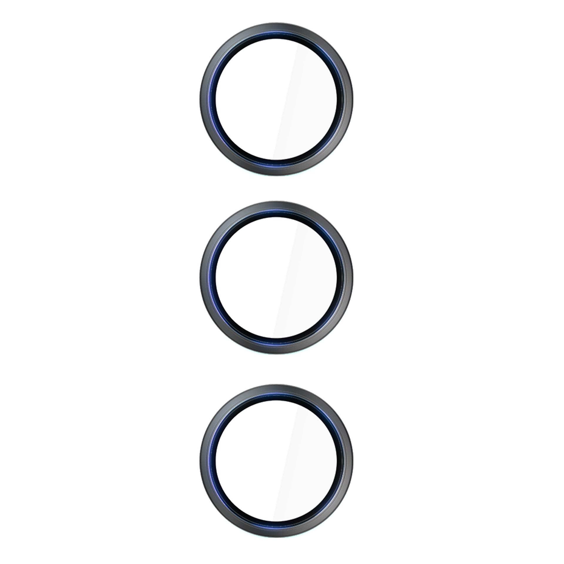 Trzy okrągłe, przezroczyste szklane osłony ekranu są ustawione pionowo. Każda ma ciemnoszarą ramkę i niebieski wewnętrzny pierścień.