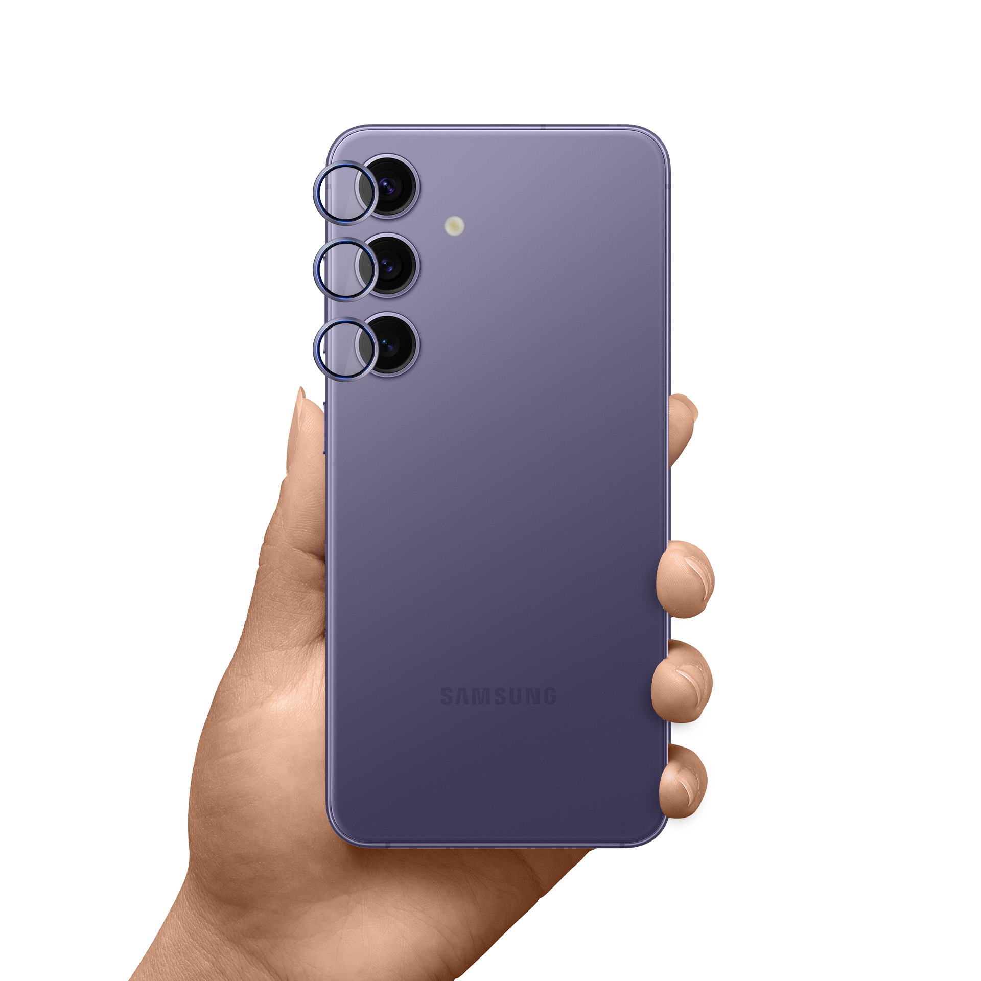 Ręka trzyma fioletowy telefon Samsung. Z tyłu widoczne są trzy obiektywy aparatu. Logo Samsunga znajduje się na dole.