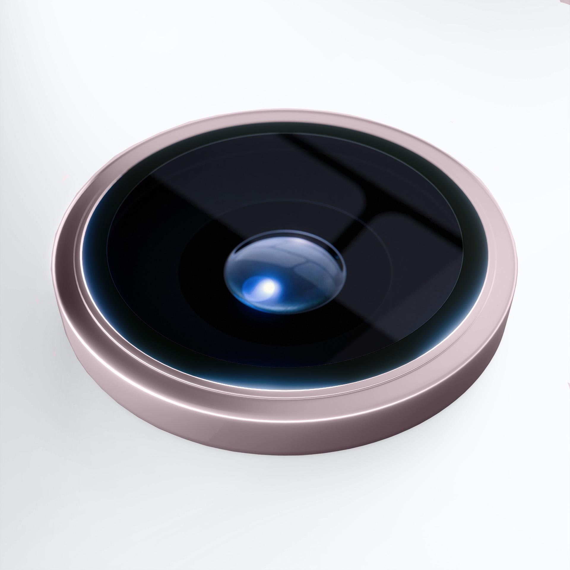 Primo piano dell'obiettivo di una fotocamera del telefono. Ha una lente scura con un anello in oro rosa metallizzato, su sfondo bianco.