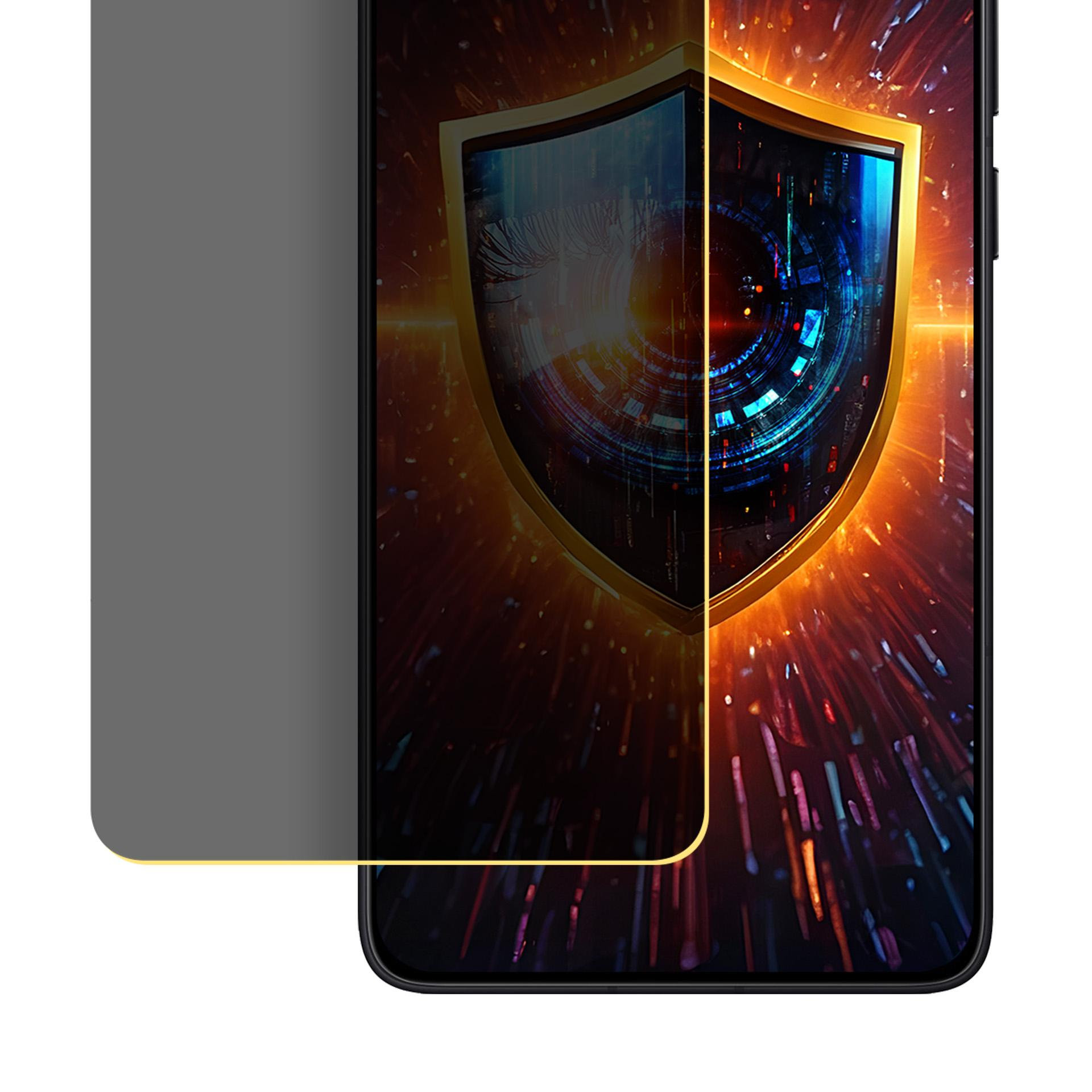 Schermo del telefono con grafica a scudo. Un proteggi schermo è applicato a sinistra. Lo sfondo ha riflessi arancioni e blu.
