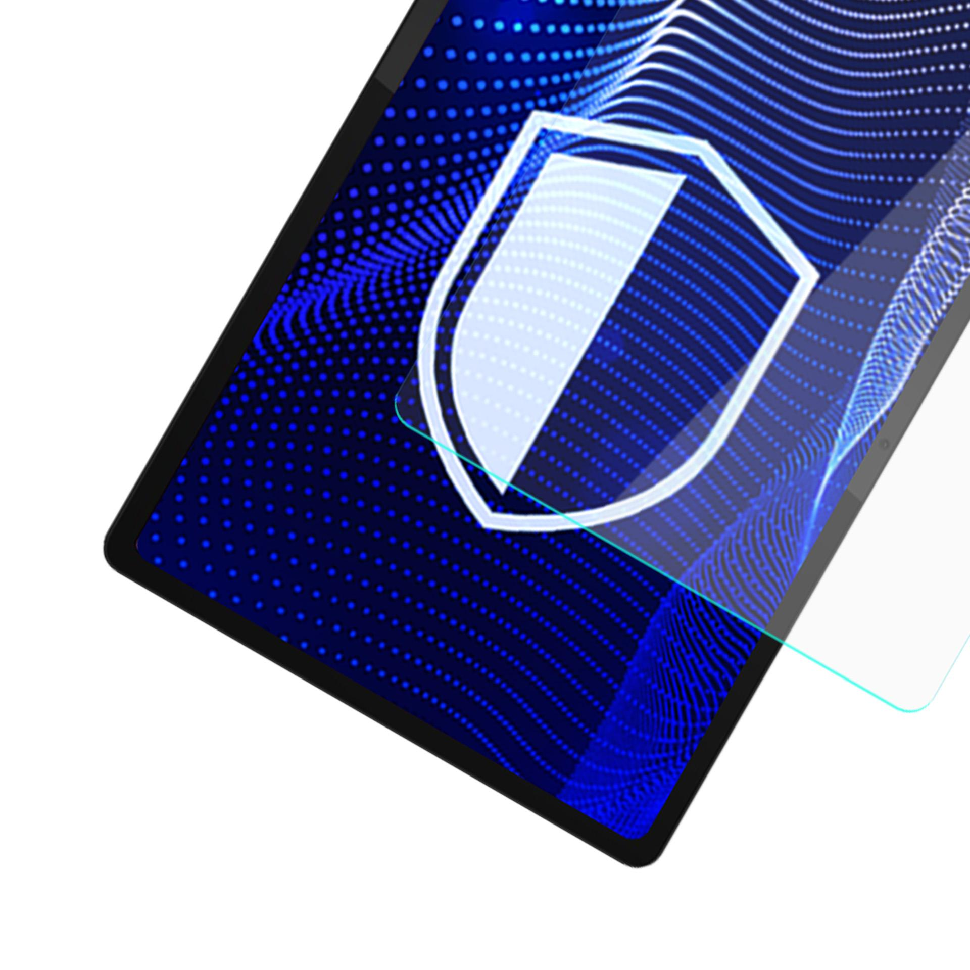 Tablet z niebieskim, kropkowanym tłem i ikoną tarczy. Widoczna jest folia ochronna na ekran.