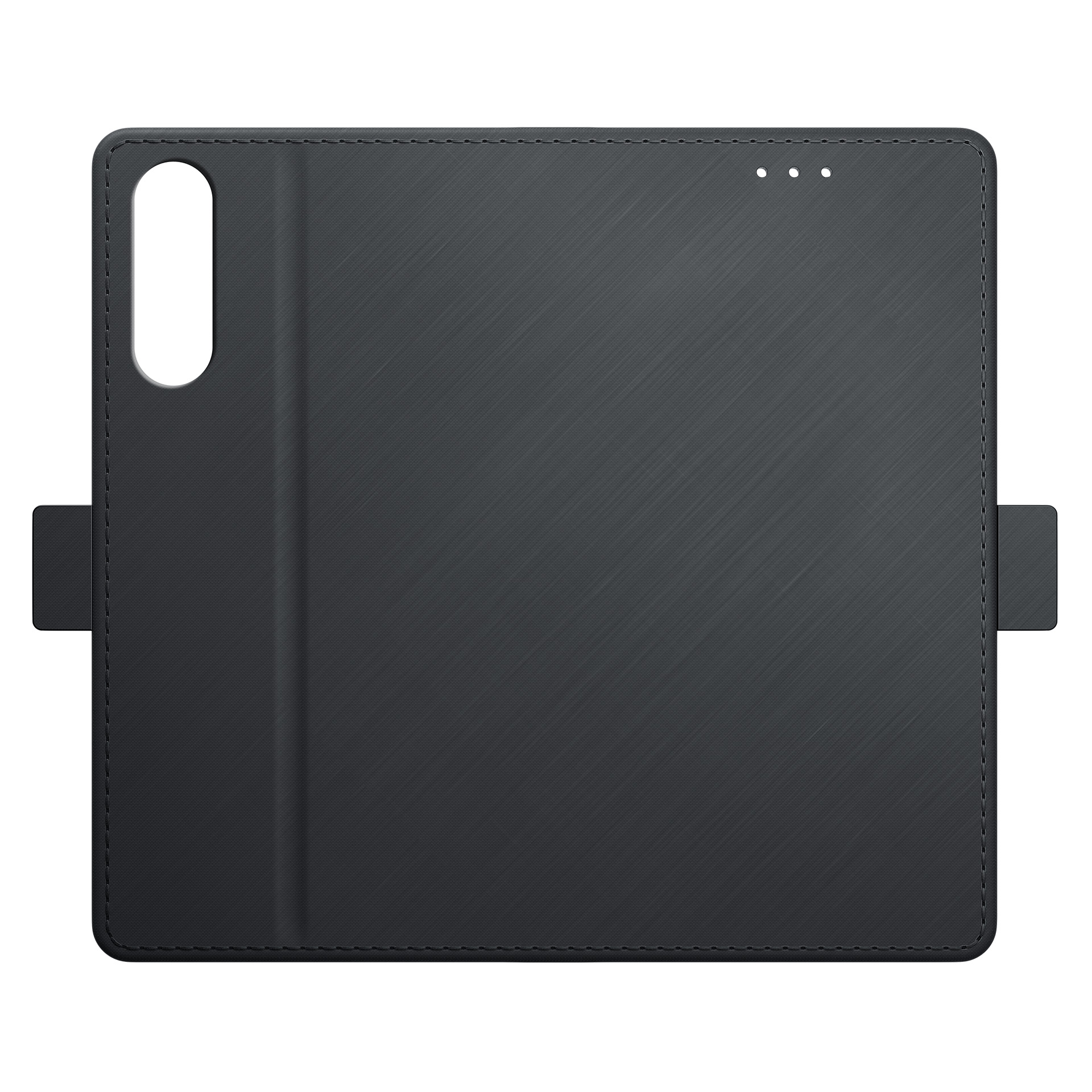 Pokazana jest ciemnoszara obudowa telefonu z klapką otwieraną w lewo. Ma wycięcie na aparat i trzy małe otwory.