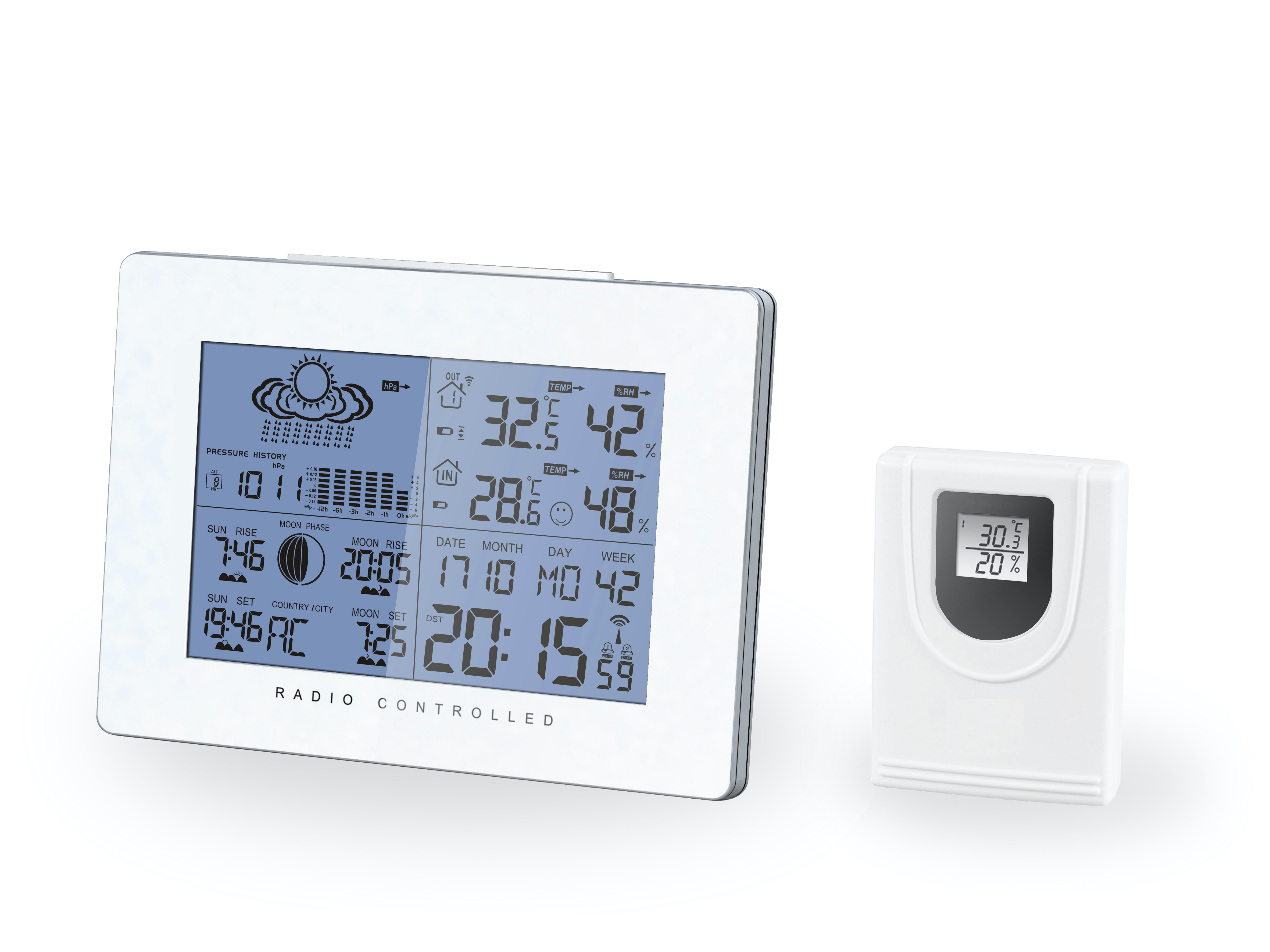 A white weather station displays temperature, humidity, and time. A smaller unit shows temperature and percentage.