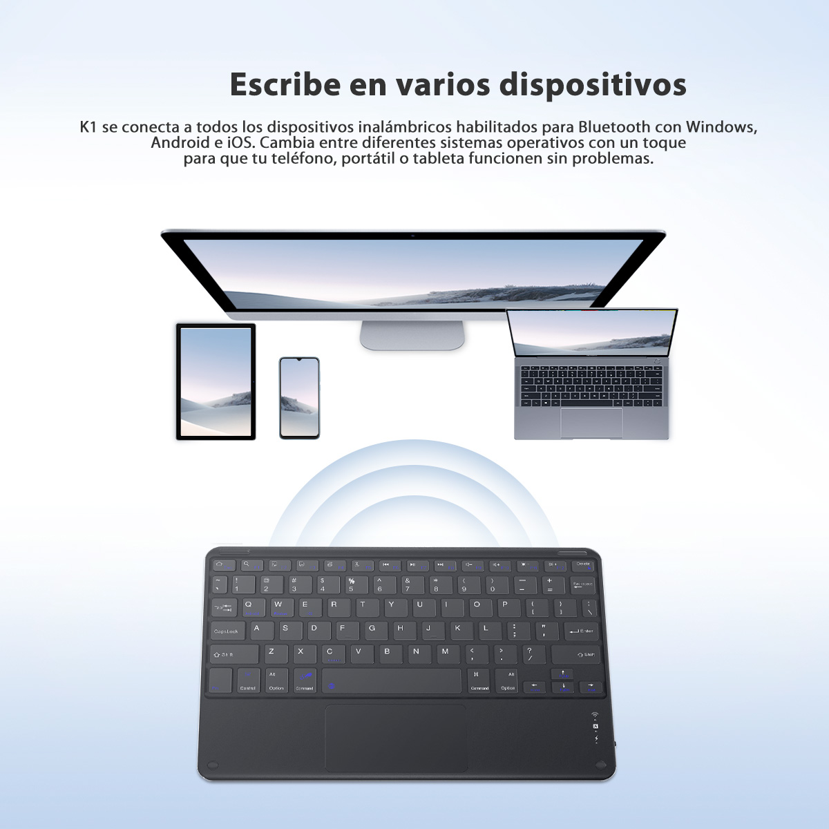 Un teclado negro con panel táctil en primer plano. Arriba, una laptop, tableta, teléfono y una pantalla de escritorio.