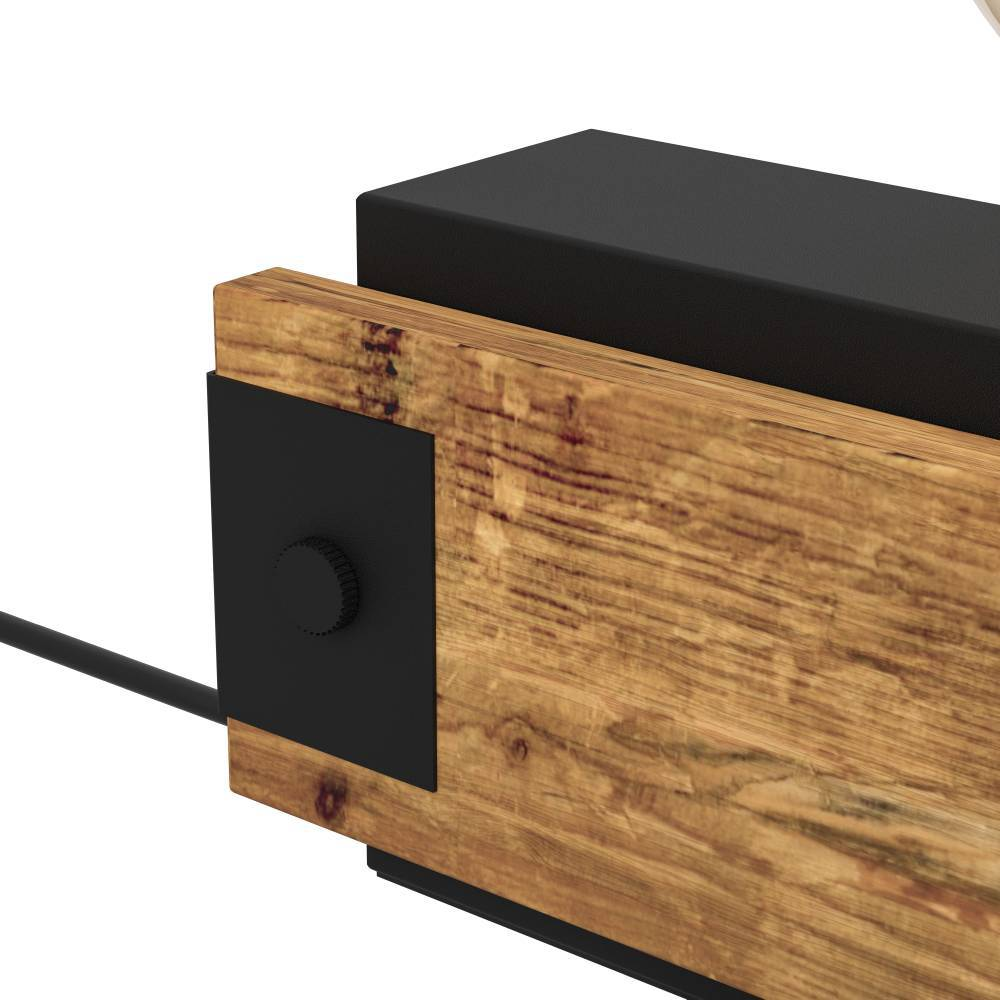 Nahaufnahme eines Holzbalkens mit schwarzen Metallakzenten. Über dem Balken befindet sich ein schwarzes Rechteck. Links ist ein schwarzes Kabel.