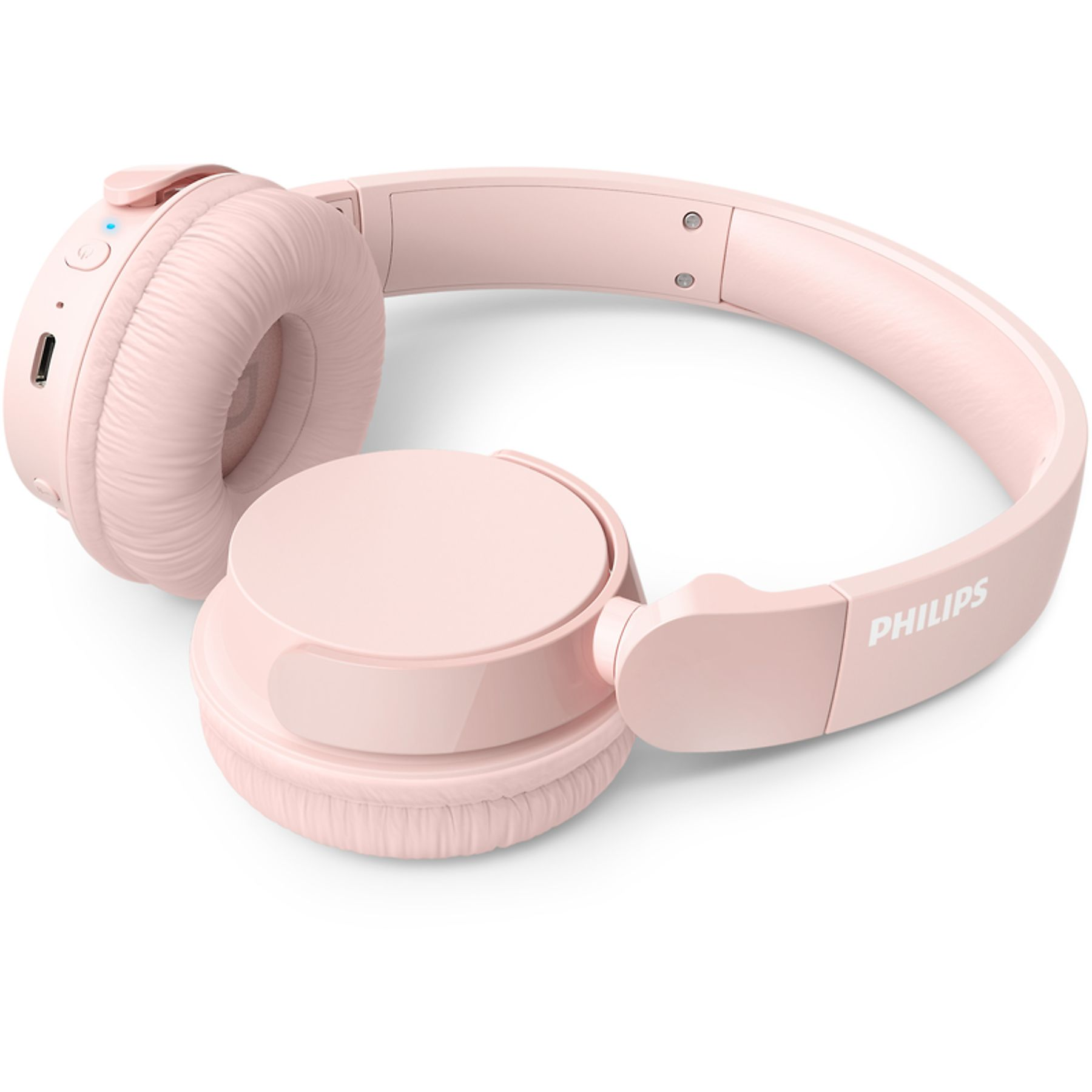 Light pink Philips headphones on a white background. The headphones are wireless and folded.