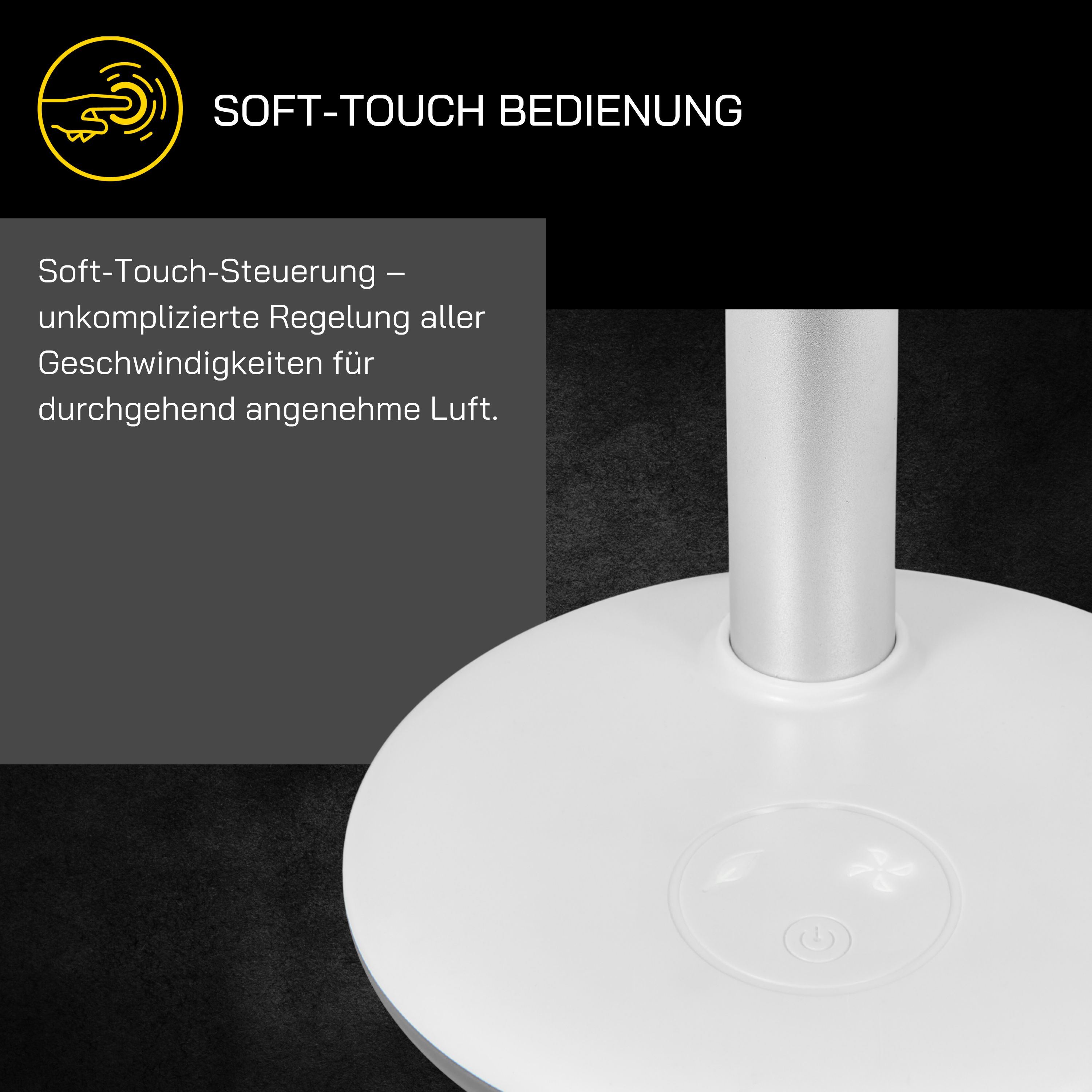 Una base de ventilador blanca con controles táctiles. Se eleva un poste plateado. El texto dice 'SOFT-TOUCH BEDIENUNG'.