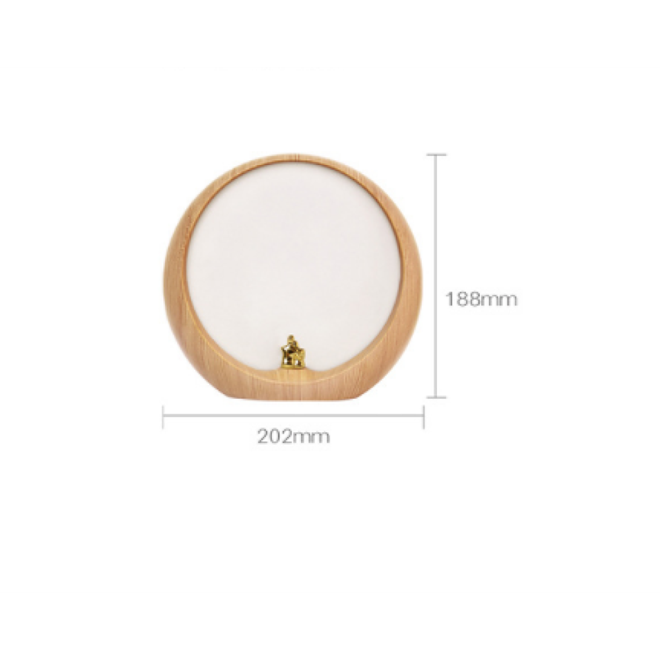 Ein Bild einer Holzlampe mit weißem Bildschirm und einer kleinen goldenen Figur am Fuß.